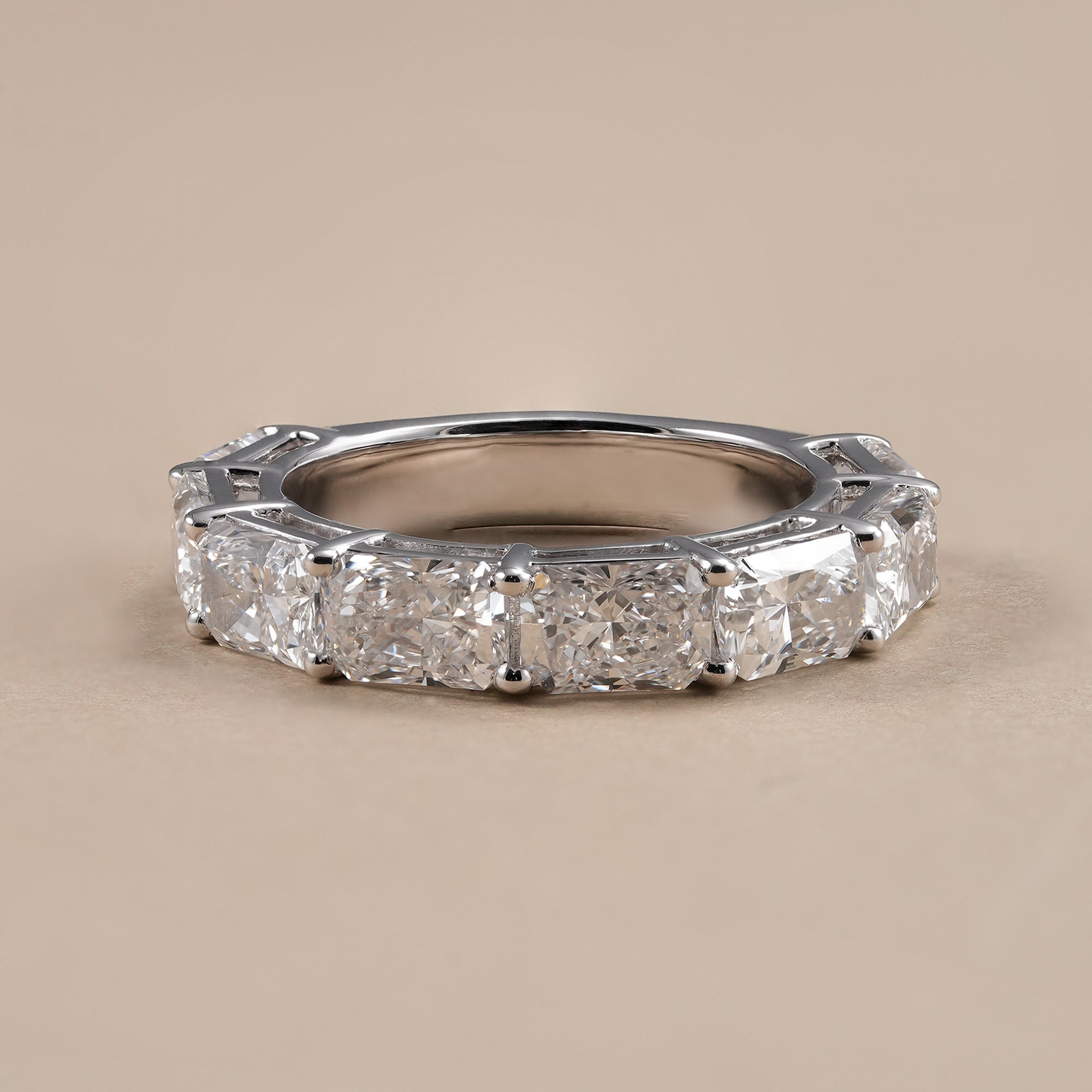 Radiant cut lab grown diamond half eternity wedding band in solid gold