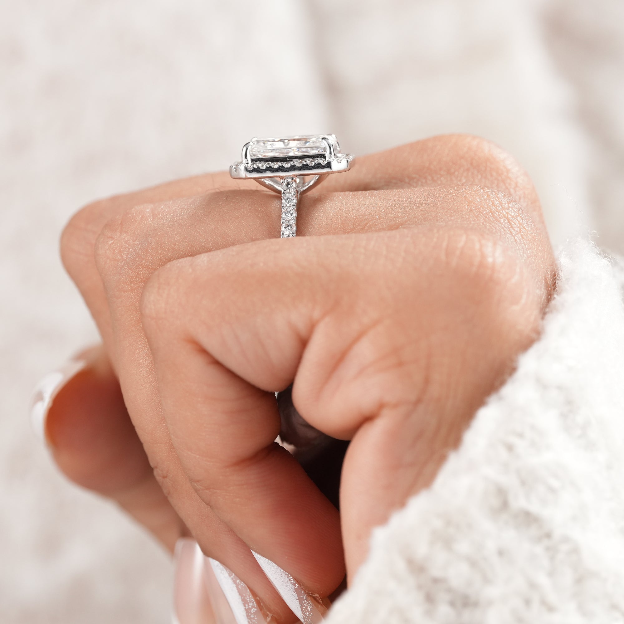 Luxury radiant engagement ring with brilliant halo.