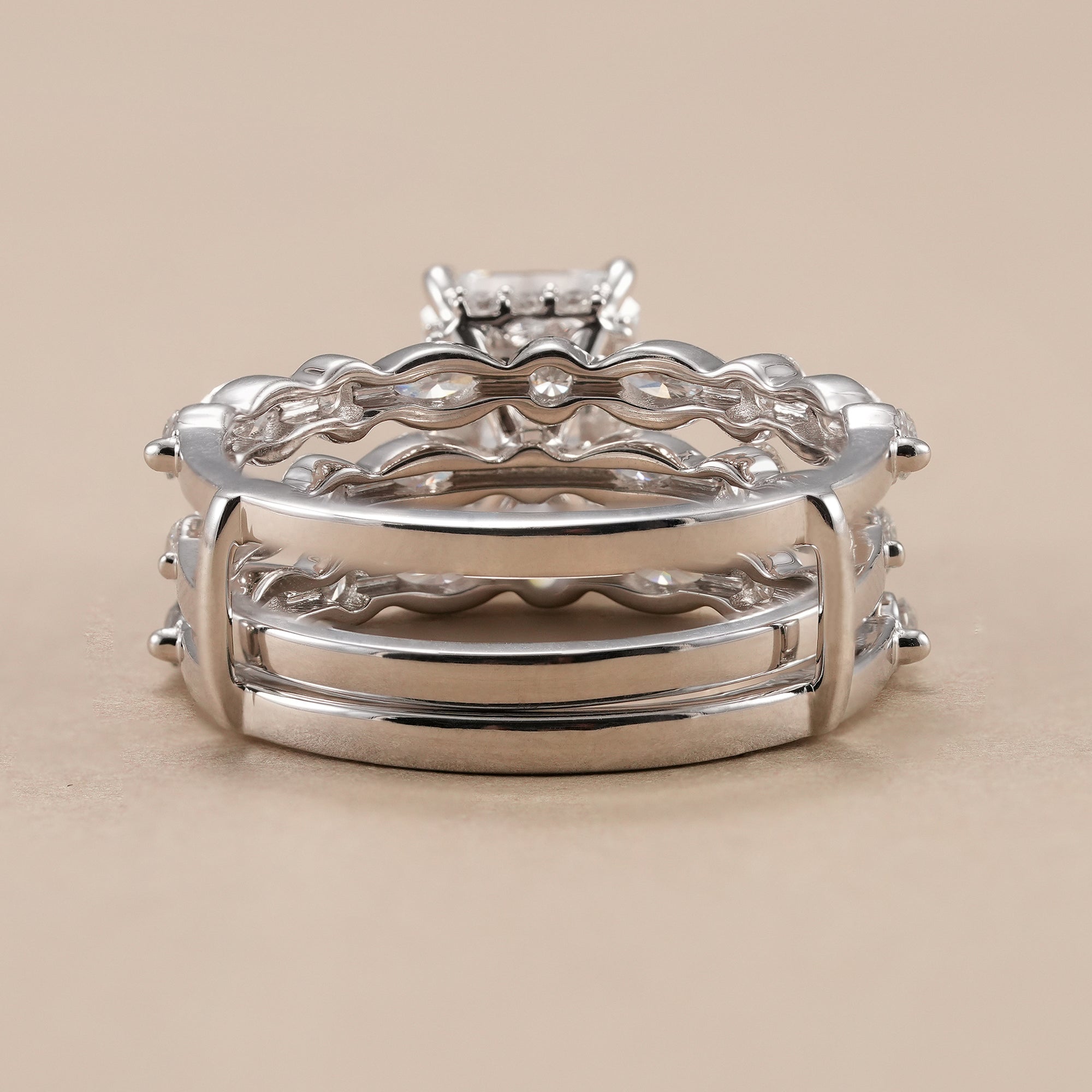 Matching bridal wedding ring set featuring radiant center diamond.
