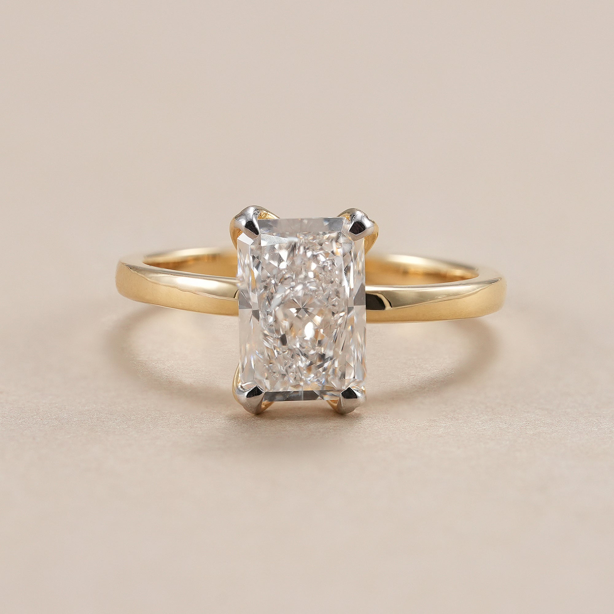 Radiant diamond solitaire ring with IGI certified lab grown diamond in yellow gold.
