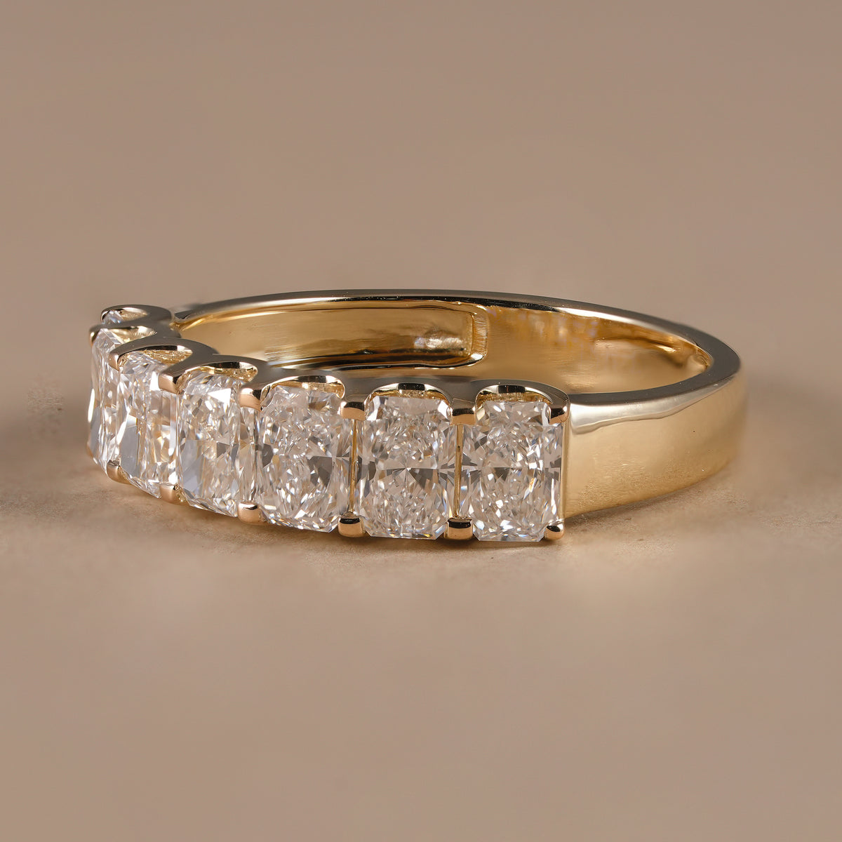 Full eternity radiant lab grown diamond band handcrafted in solid yellow gold with exceptional brilliance.