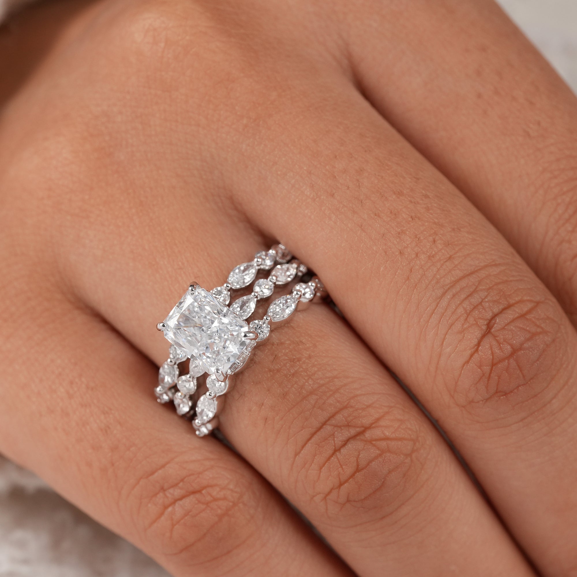 Women's IGI certified radiant diamond ring set.