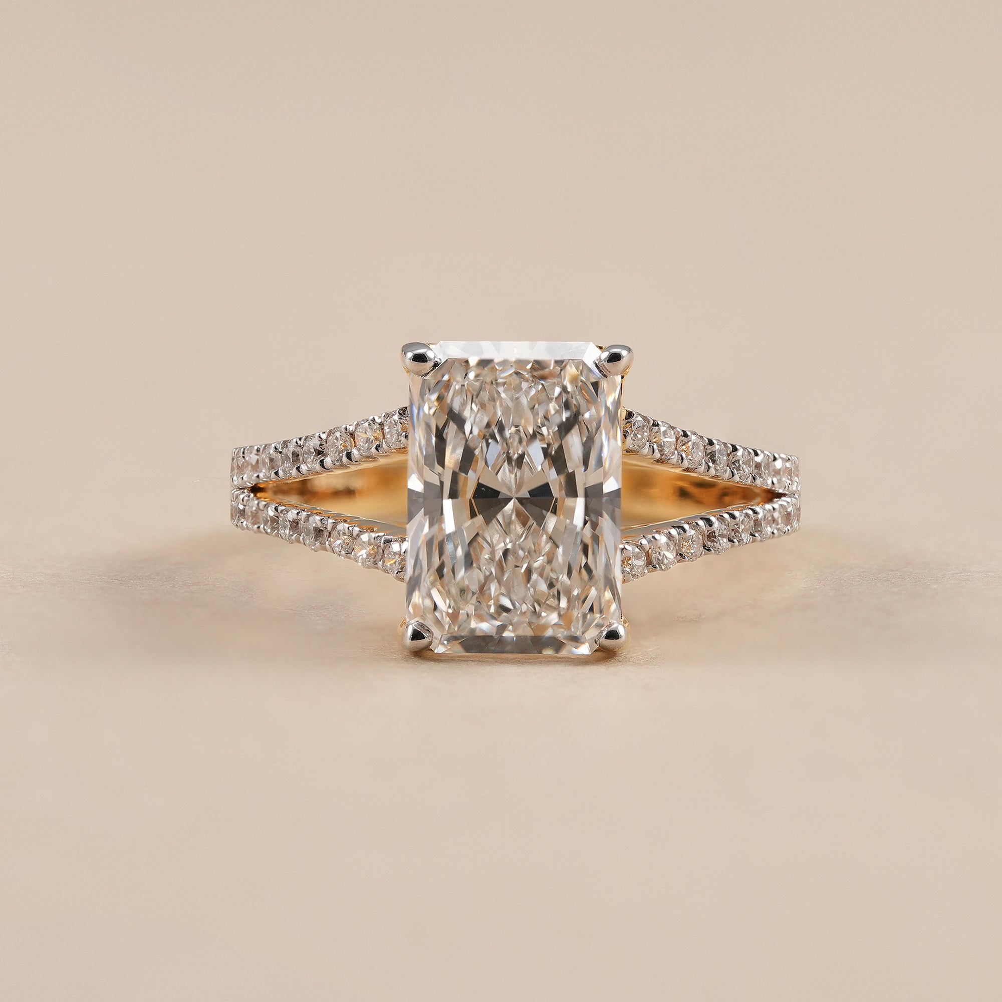 Radiant lab grown diamond engagement ring with split pavé band