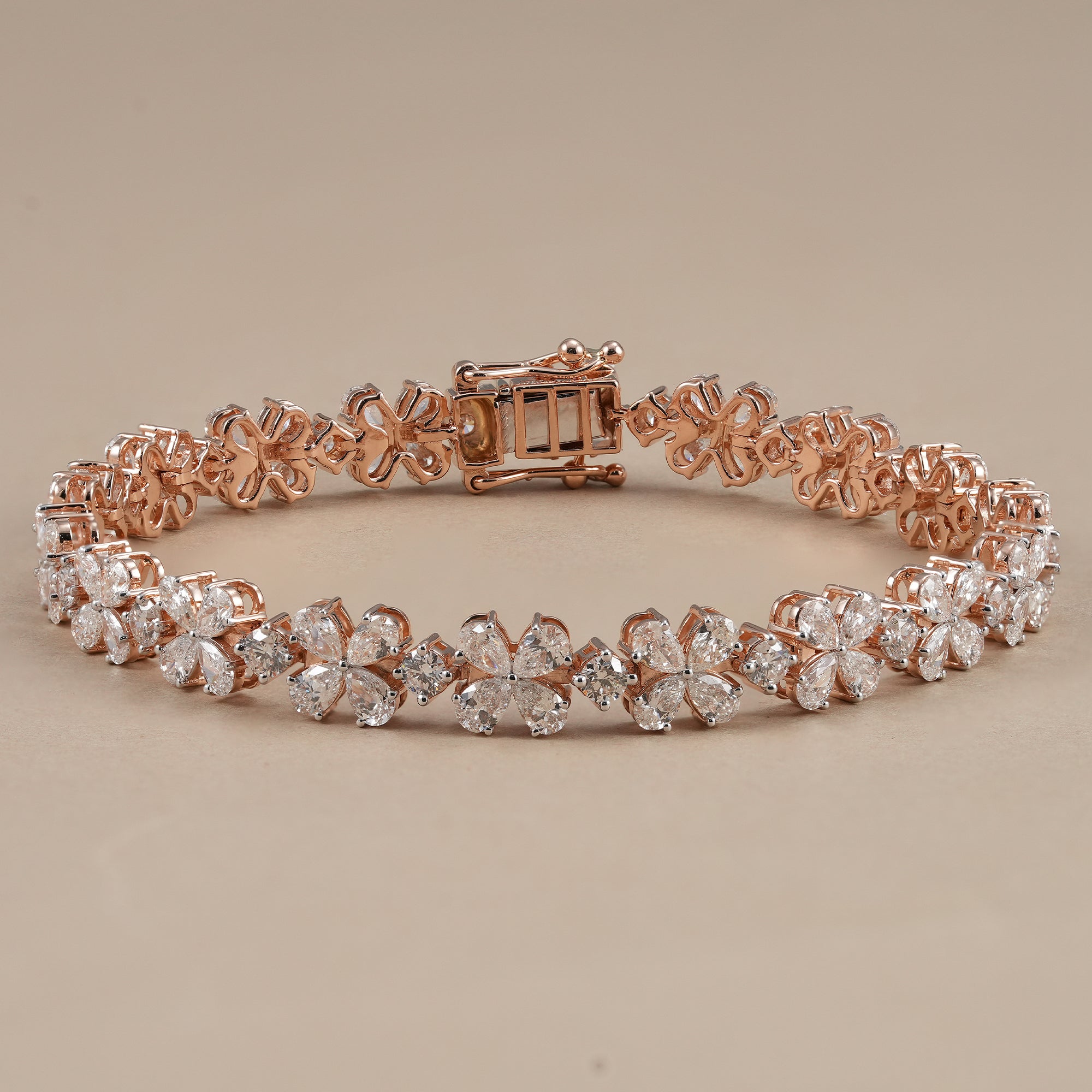 Floral inspired pear lab grown diamond tennis bracelet in rose gold