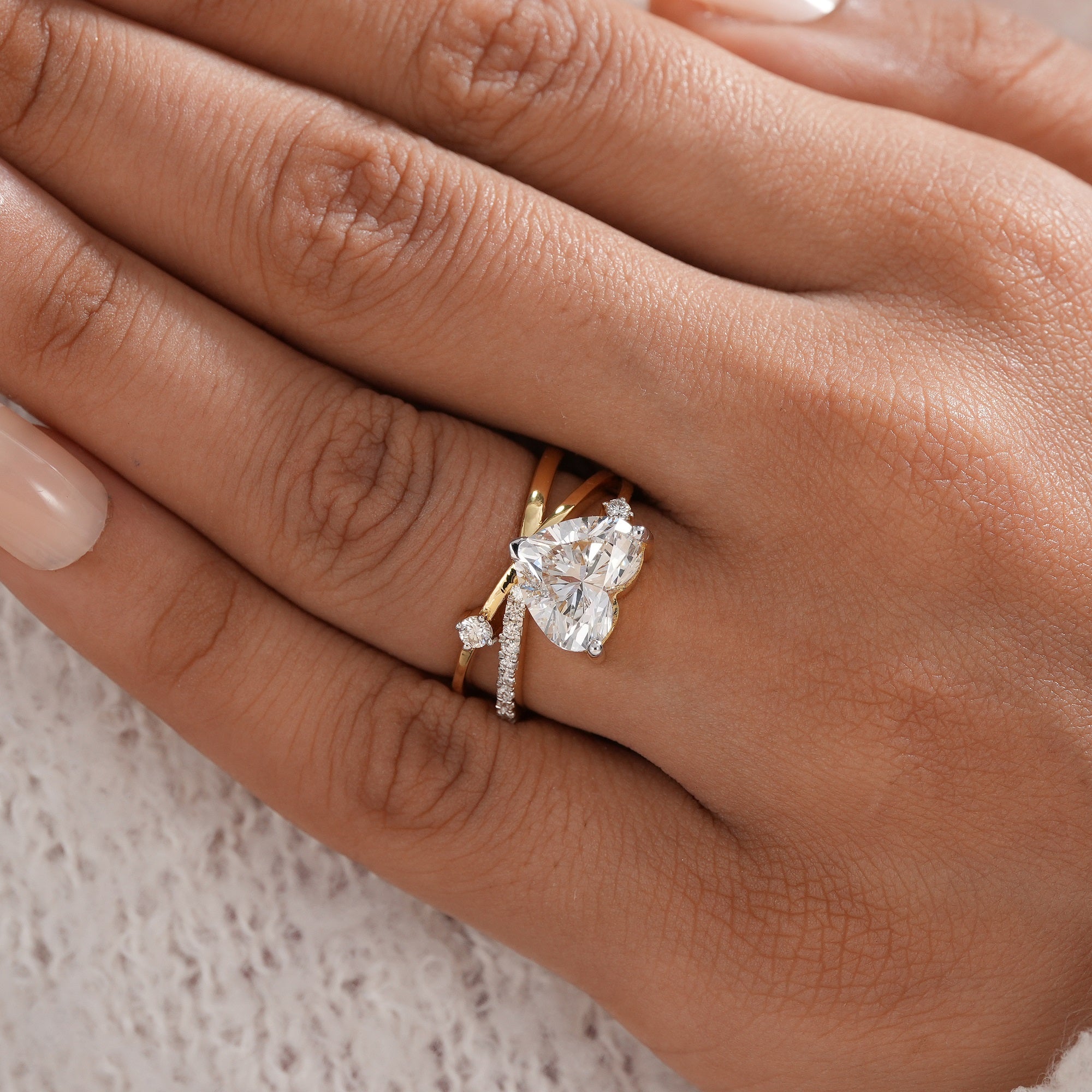 Heart lab diamond bypass ring with round diamond side accents