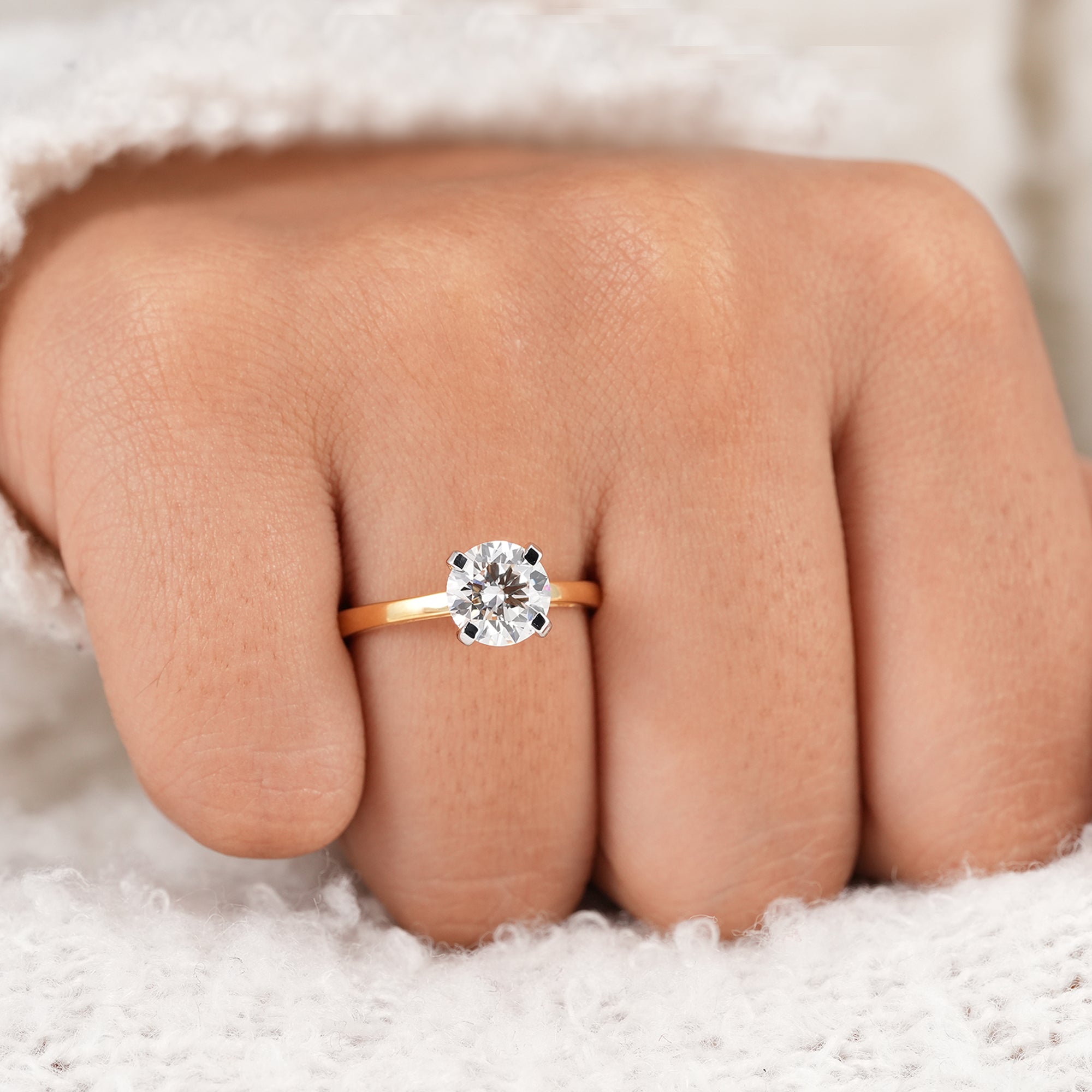 Solid gold round lab grown diamond ring with classic setting