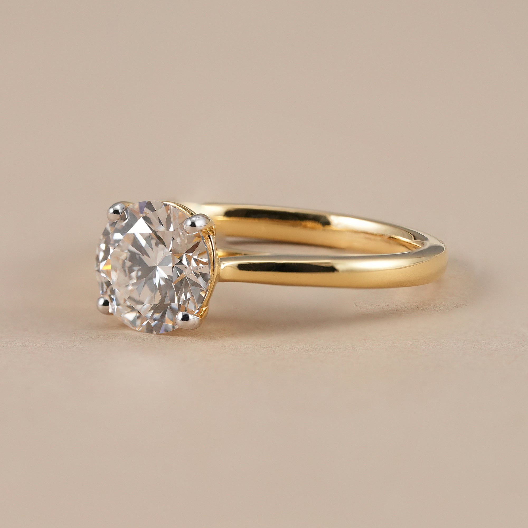 Classic 4 prong round diamond cathedral engagement ring