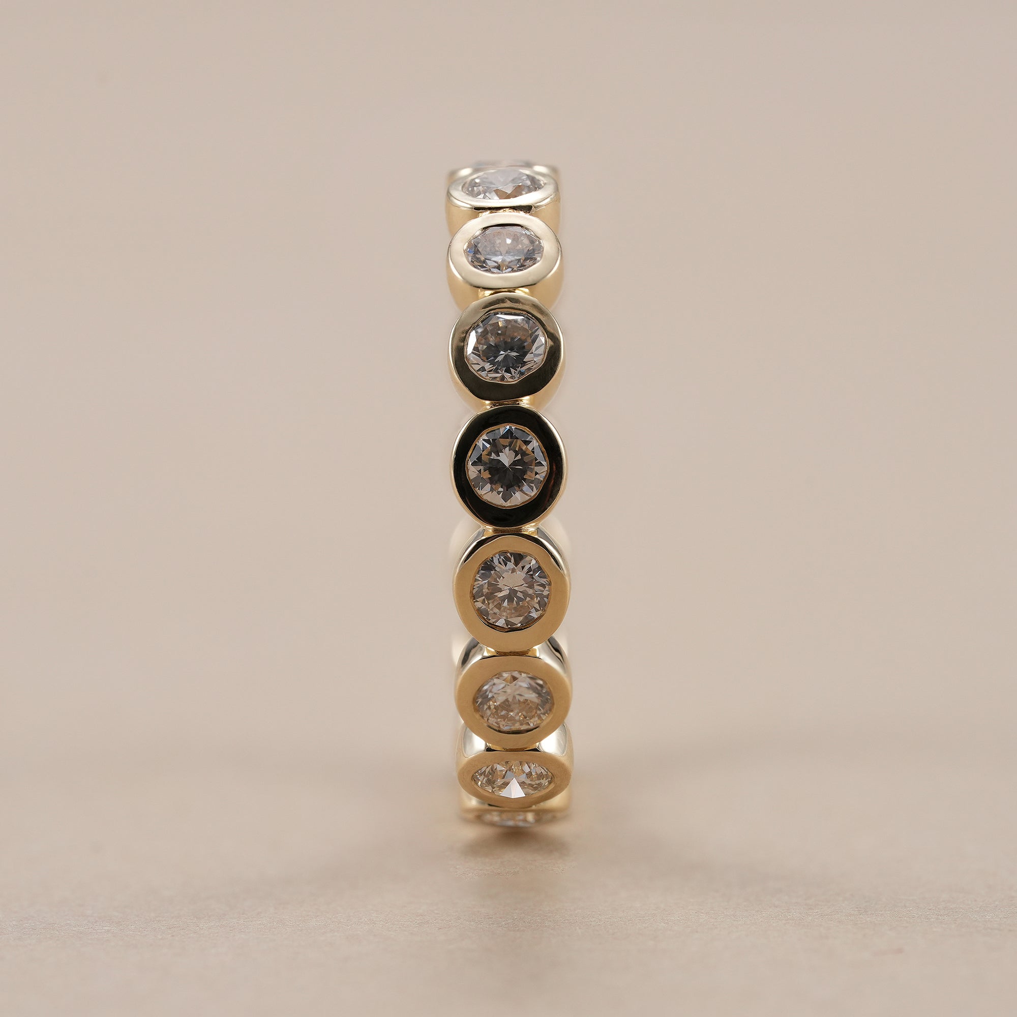 Full eternity band featuring brilliant round lab diamonds.