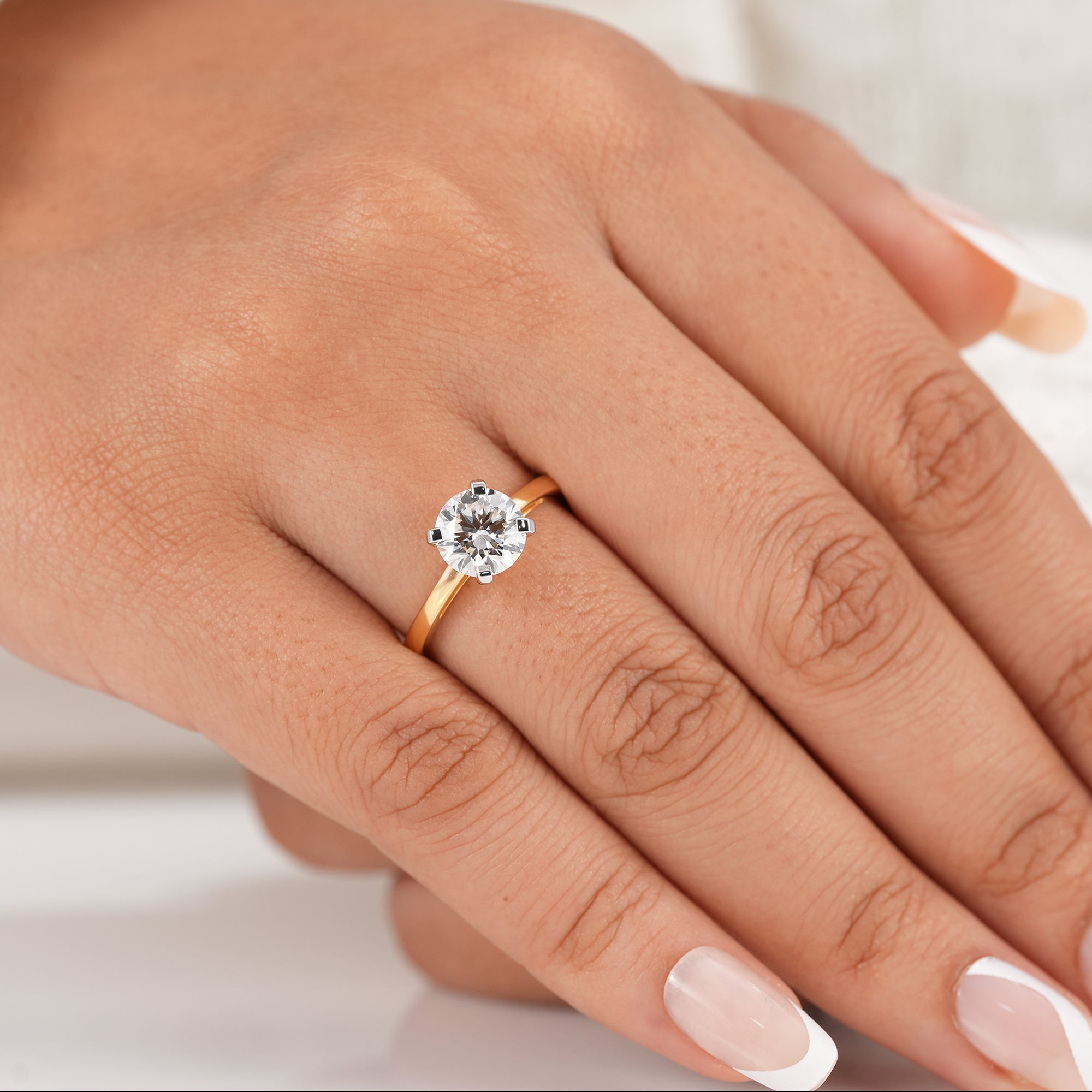 Minimalist round diamond wedding ring in solid gold