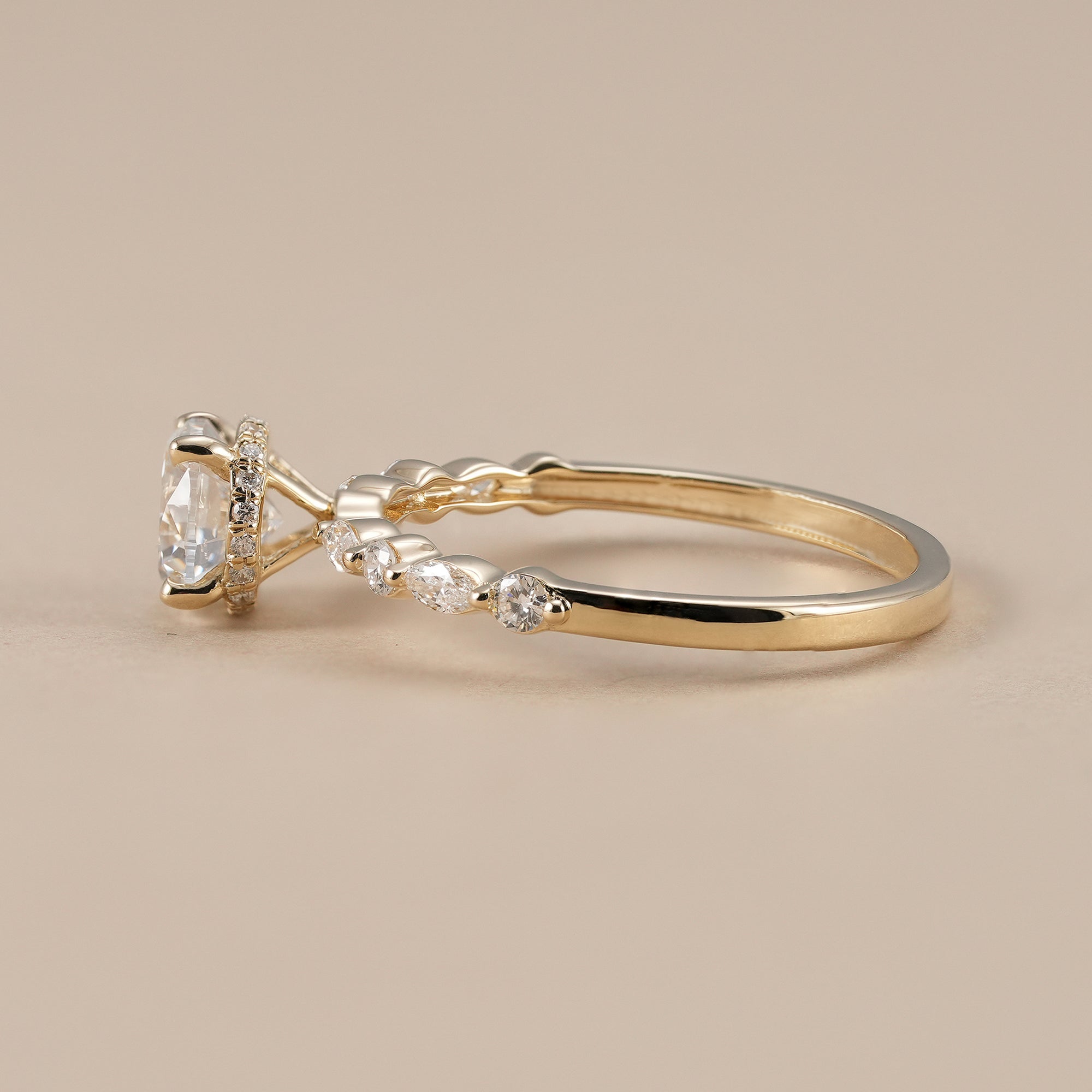 Round diamond ring with marquise and round alternating diamonds