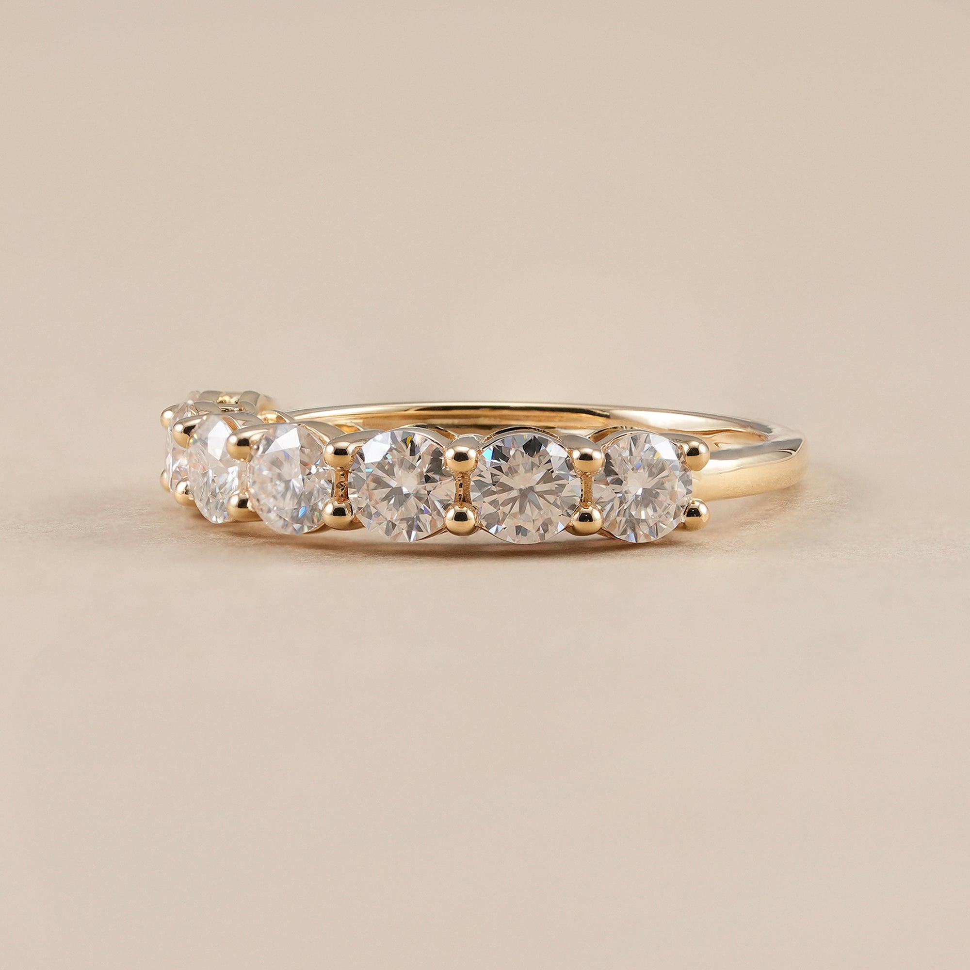 Round diamond stackable wedding ring in yellow gold