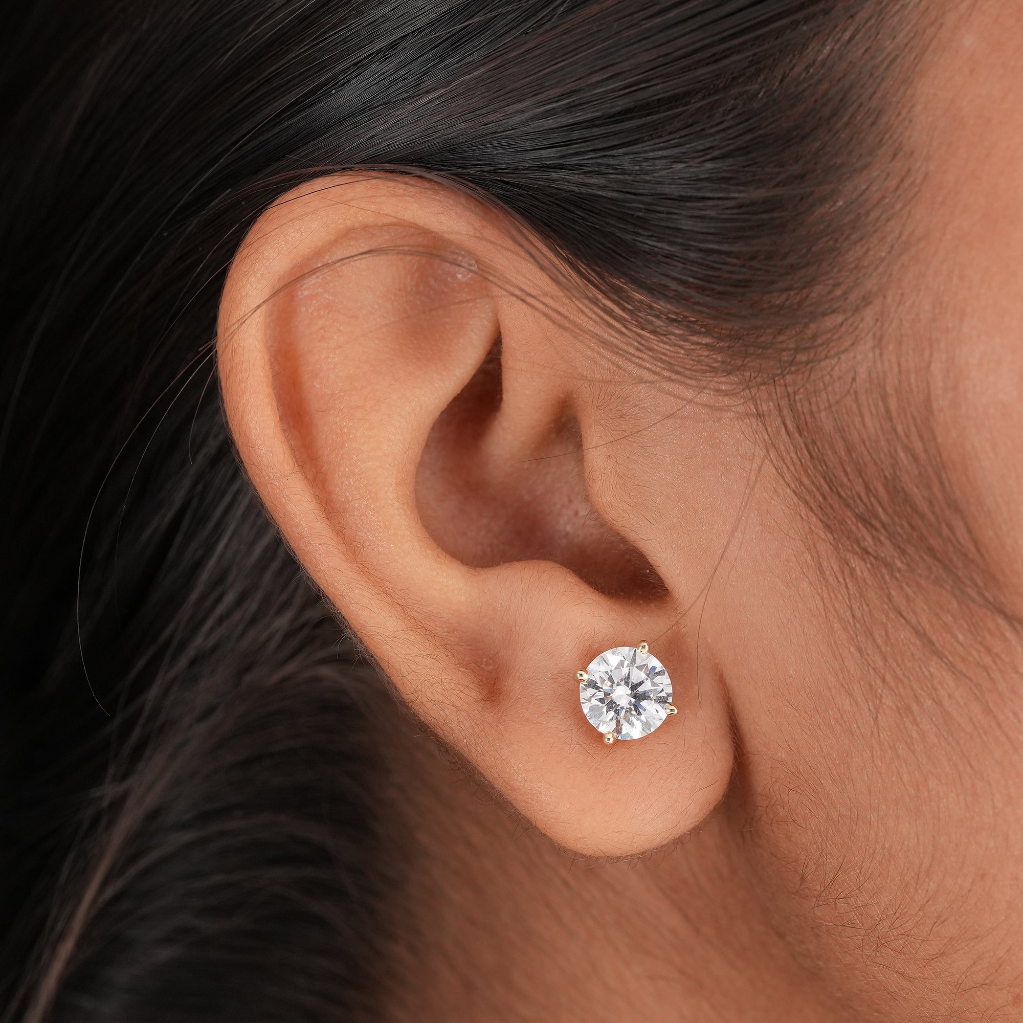 IGI certified round diamond stud earrings crafted in solid 14K yellow gold