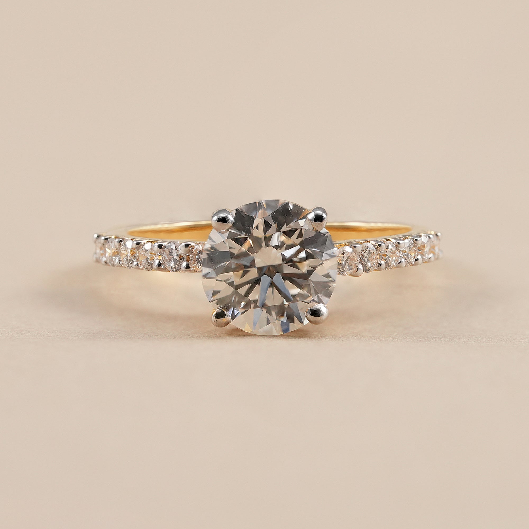 Round lab grown diamond engagement ring with pavé diamond band