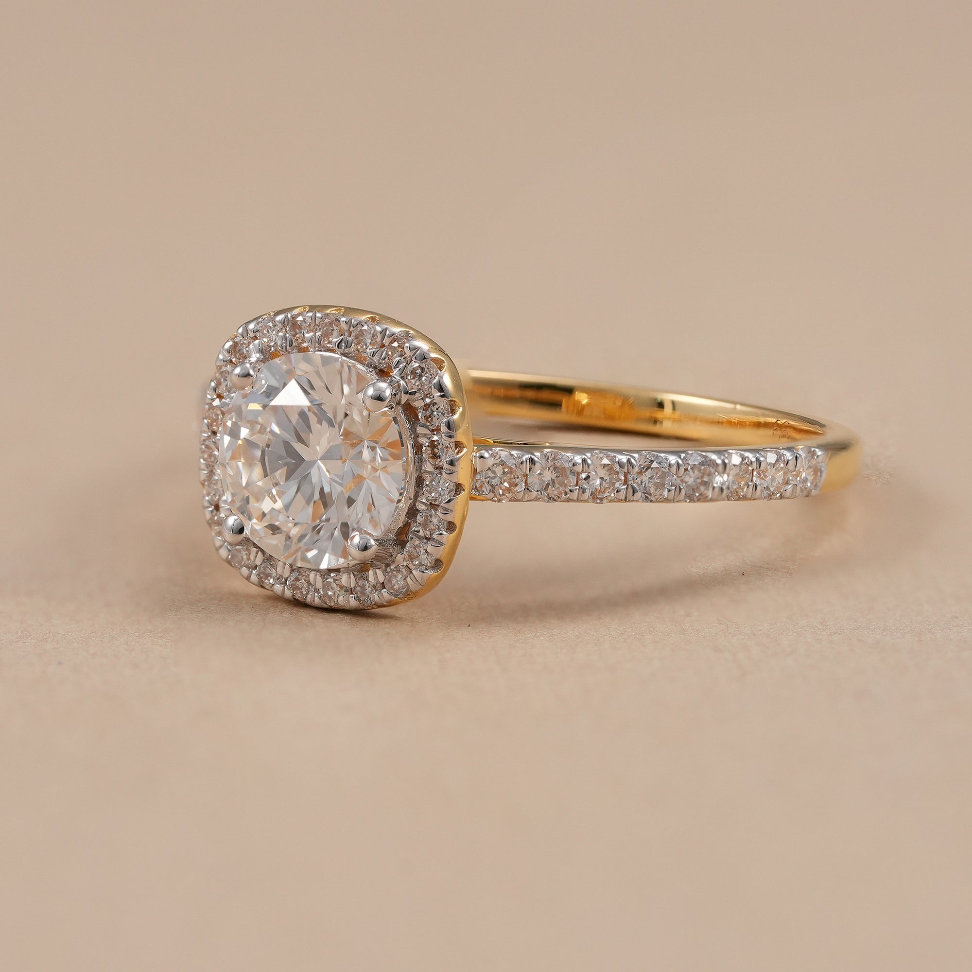 Round brilliant halo engagement ring with lab grown diamonds