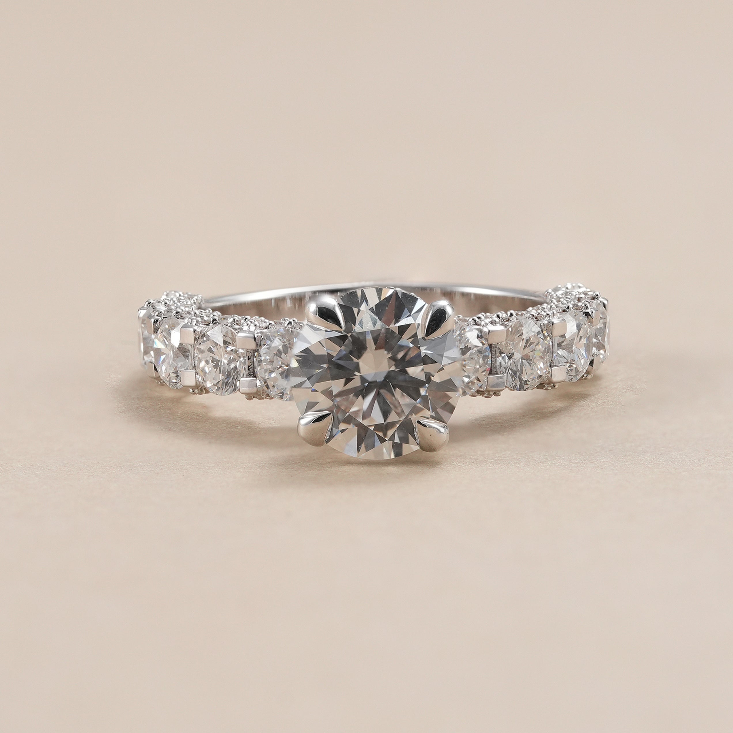 Round lab diamond engagement ring with hidden halo and full diamond band.
