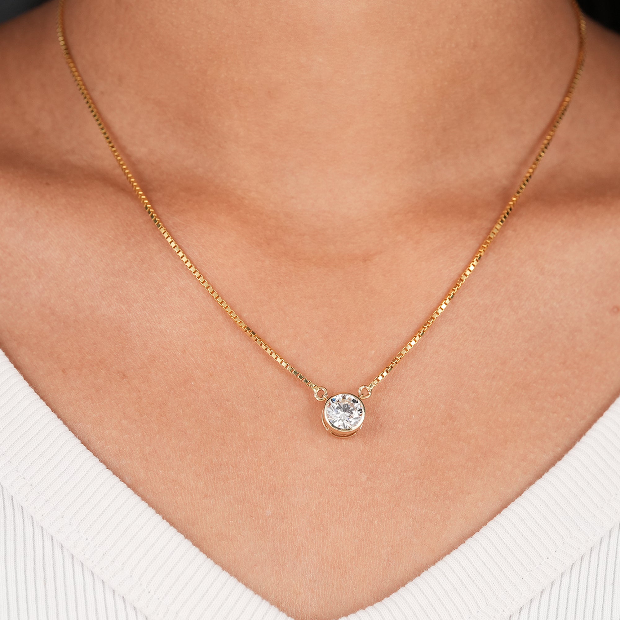 Round lab grown diamond bezel pendant necklace in yellow gold