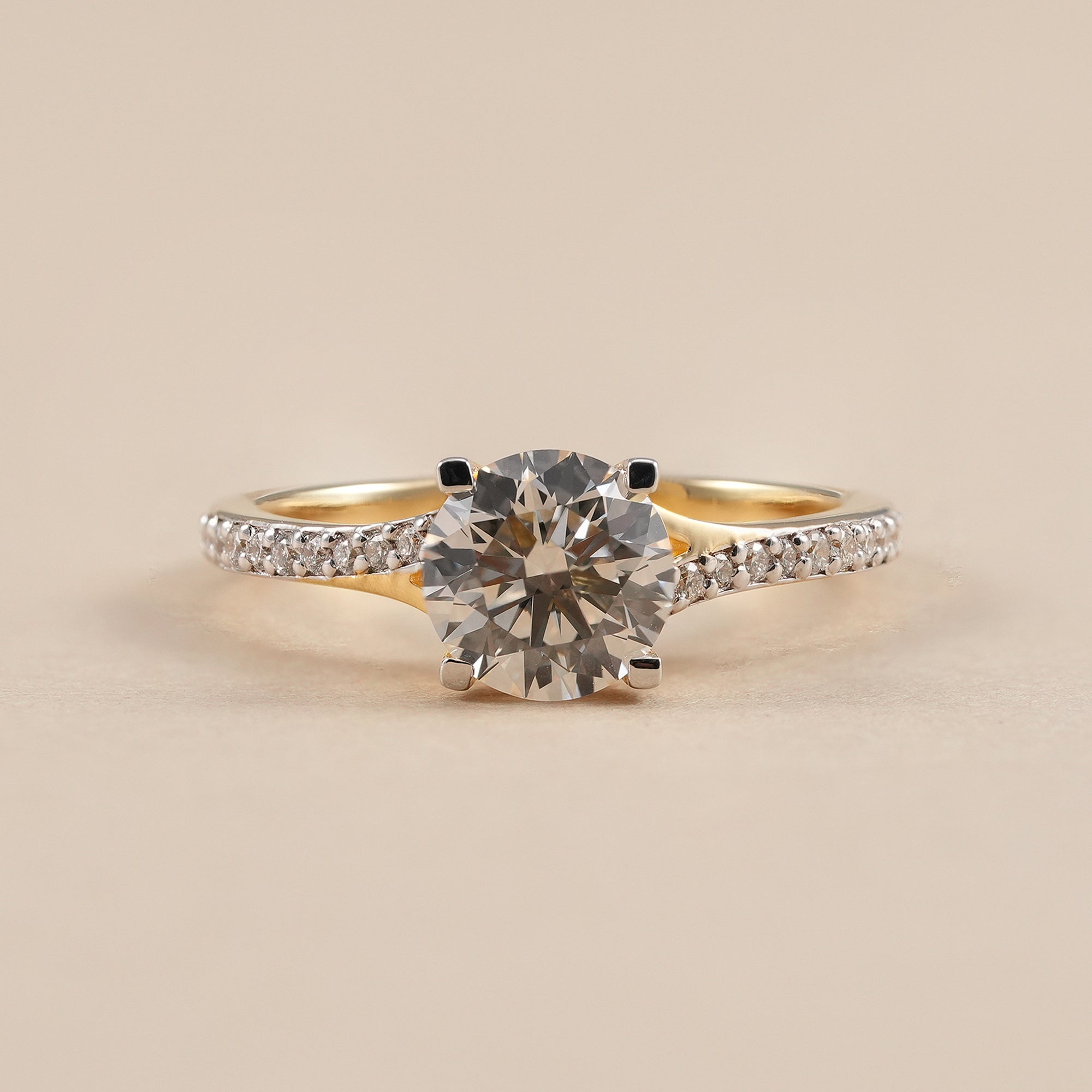 Round lab grown diamond engagement ring with pavé split shank band