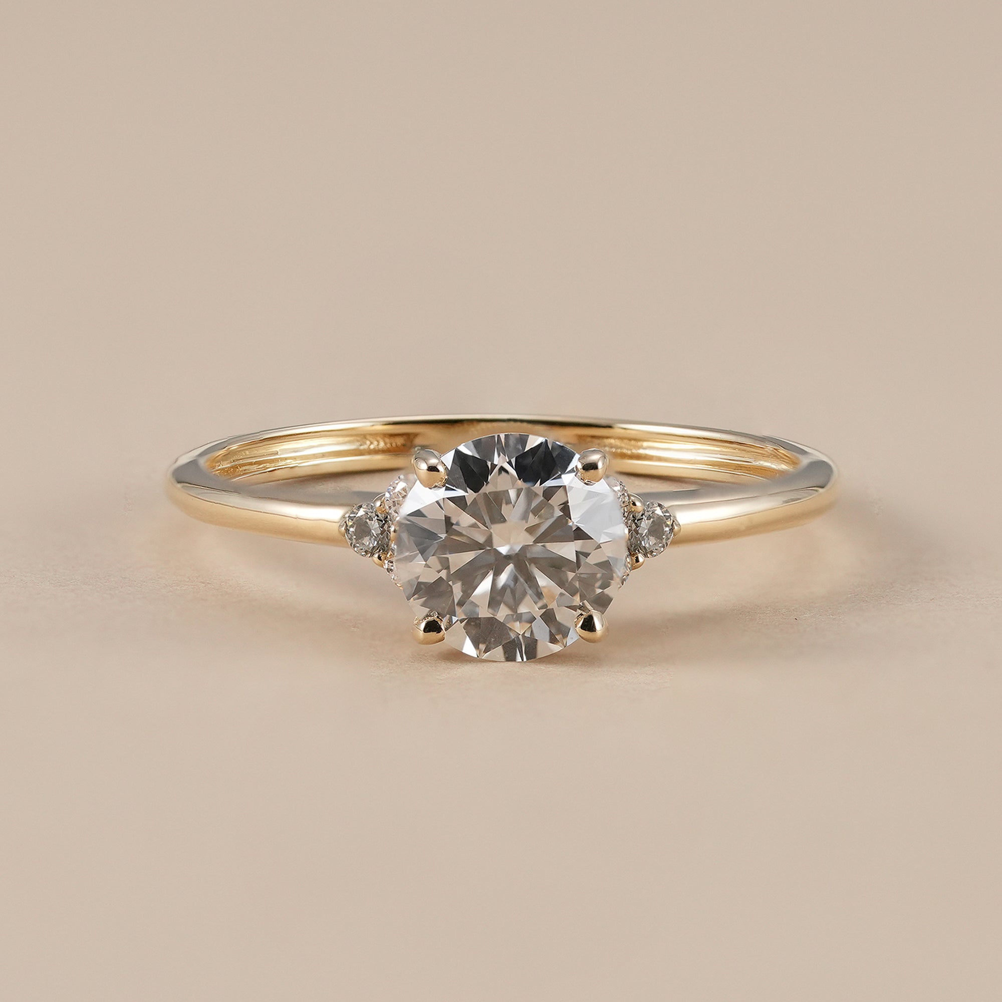Round lab grown diamond solitaire engagement ring in yellow gold