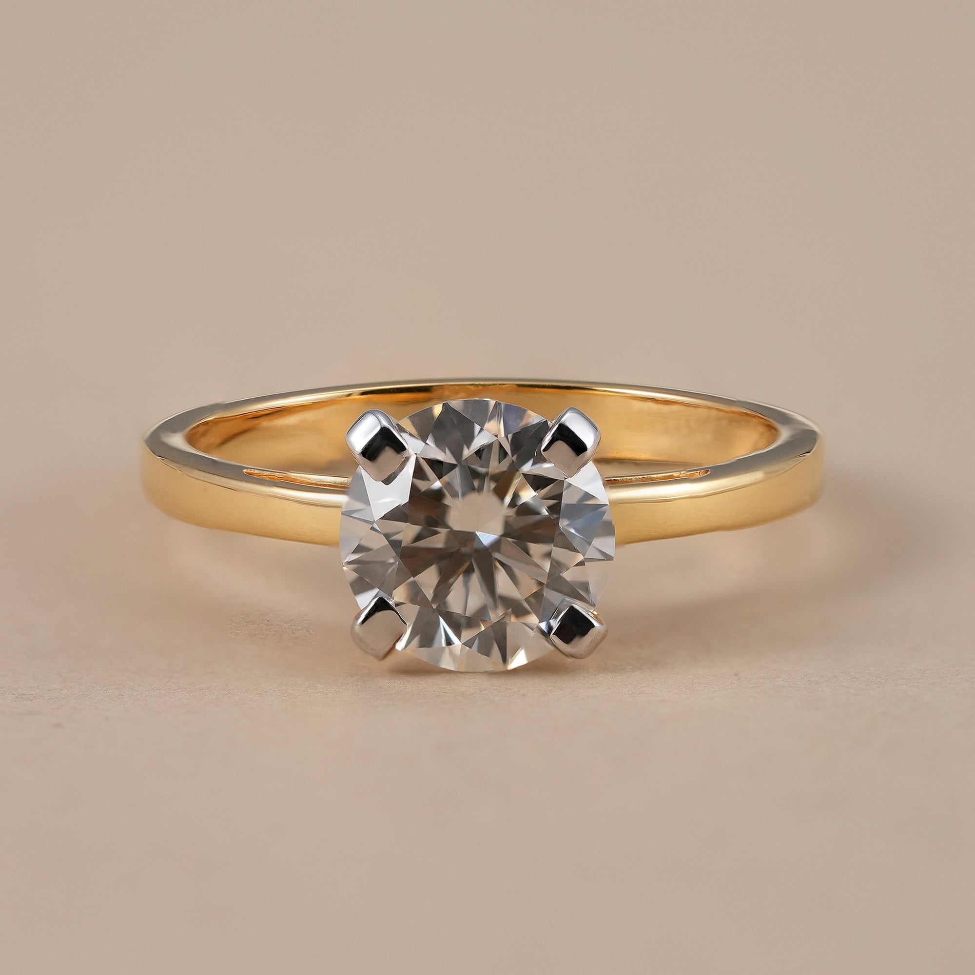 Round lab grown diamond solitaire ring in solid yellow gold