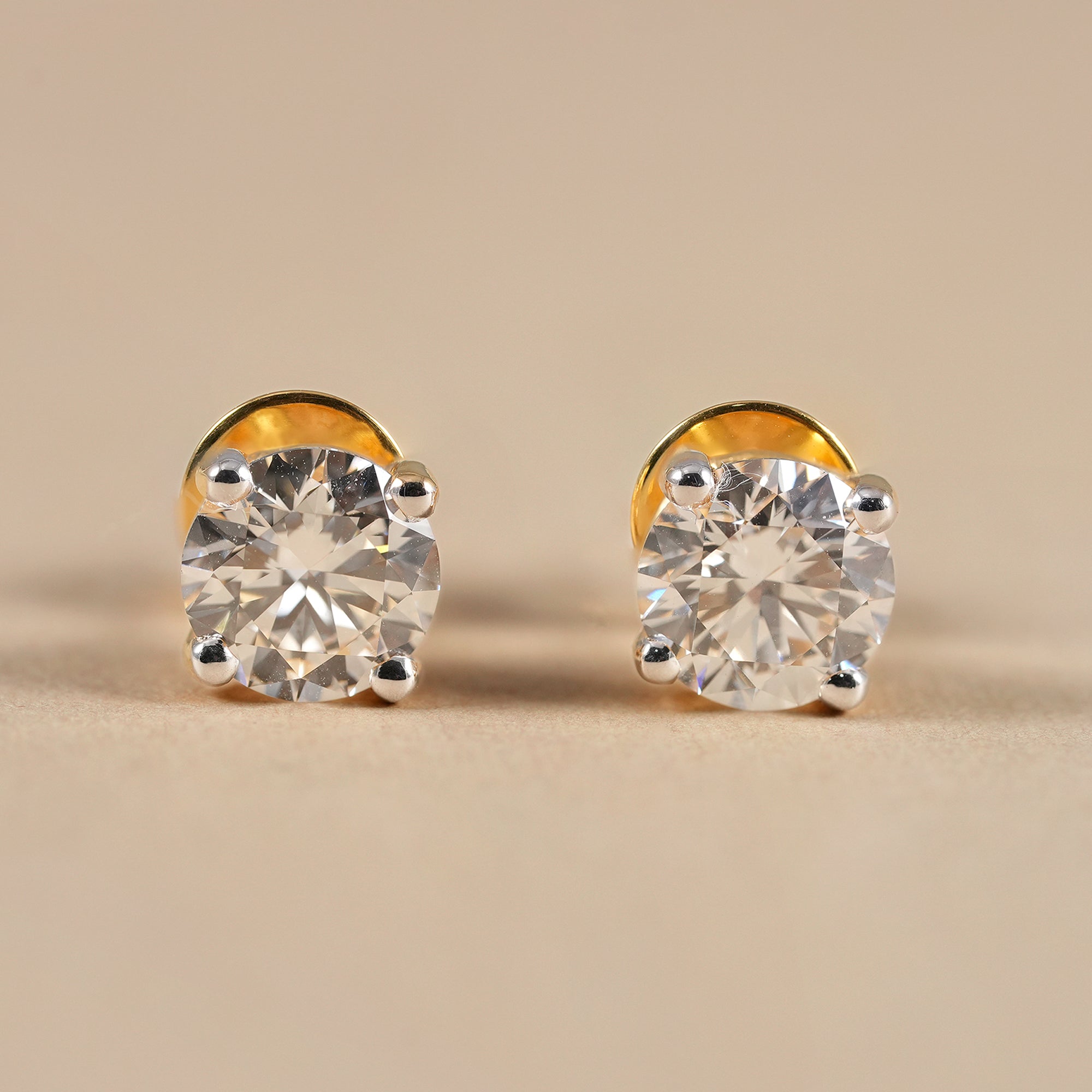 Round lab grown diamond stud earrings in solid gold