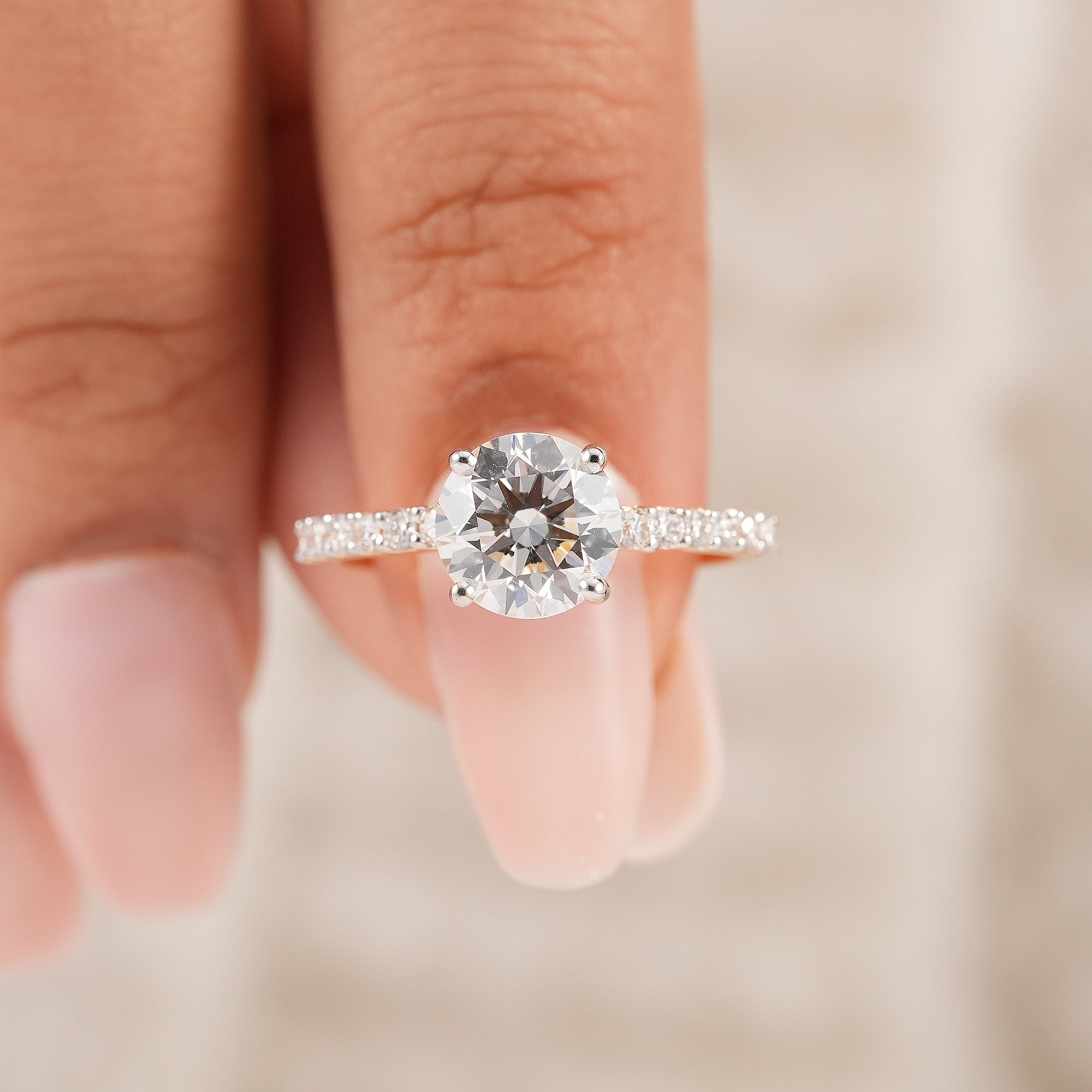 Classic round solitaire lab diamond ring in four prong setting