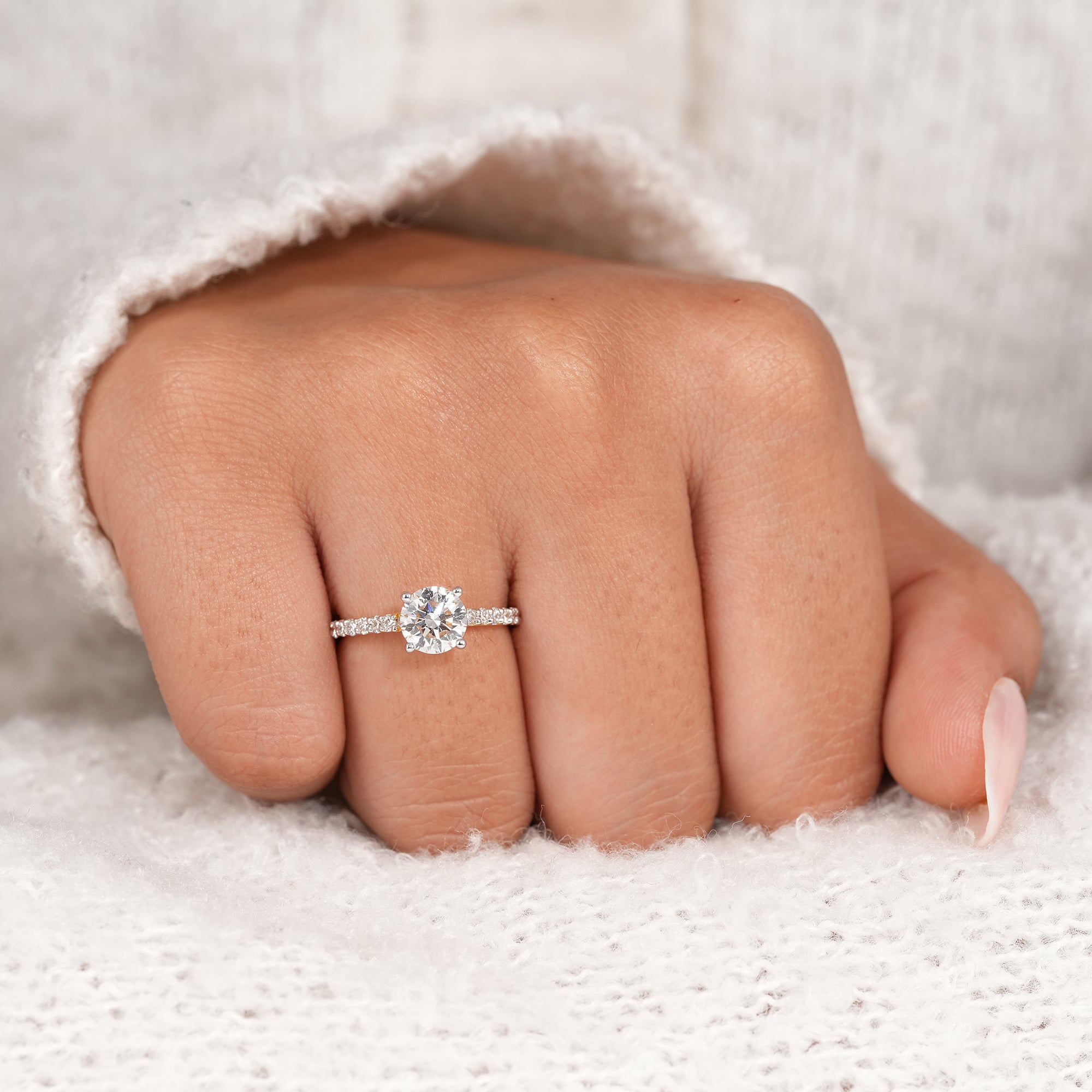 Luxury round diamond engagement ring with pavé band and IGI certified center stone