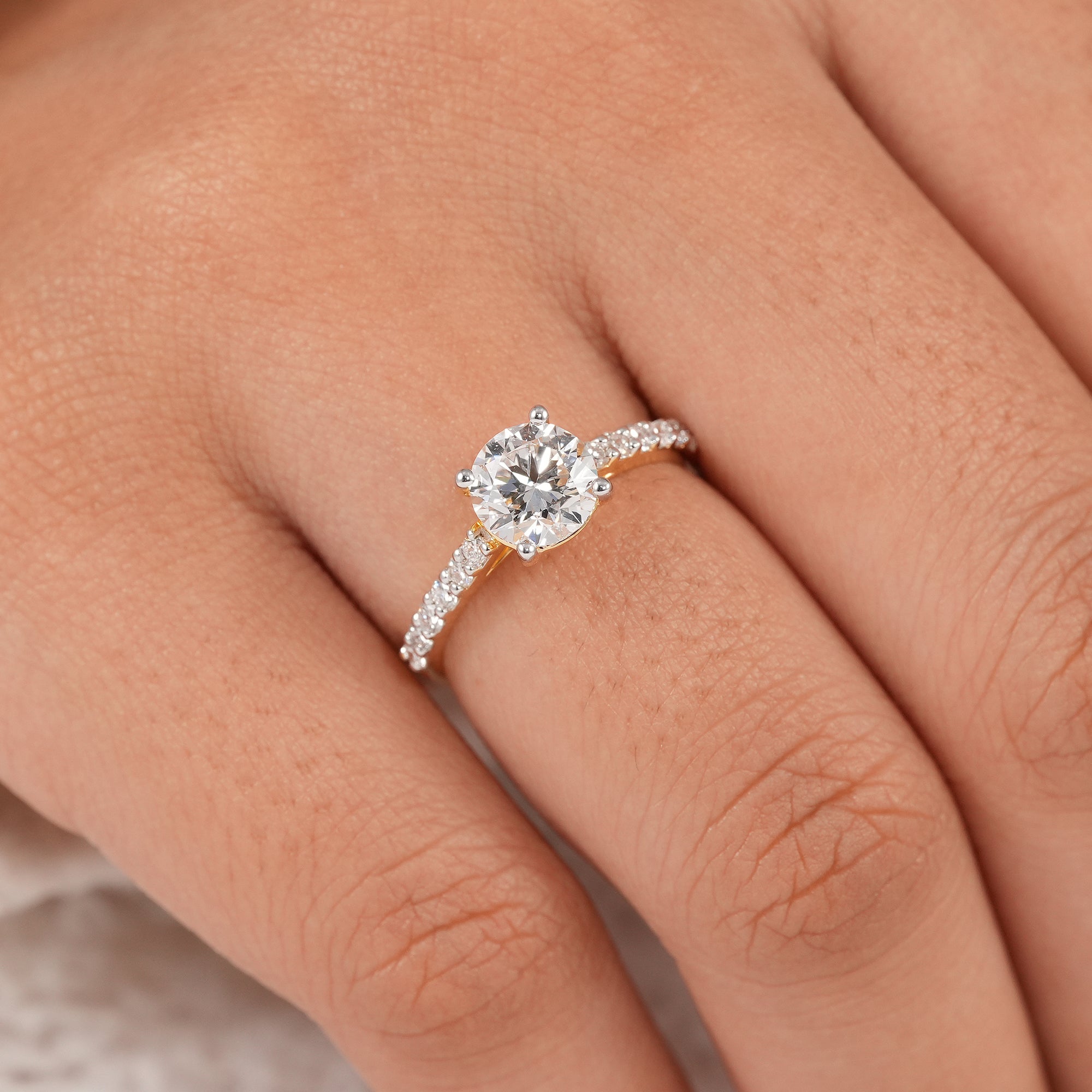 Round solitaire lab diamond ring in elegant four prong setting