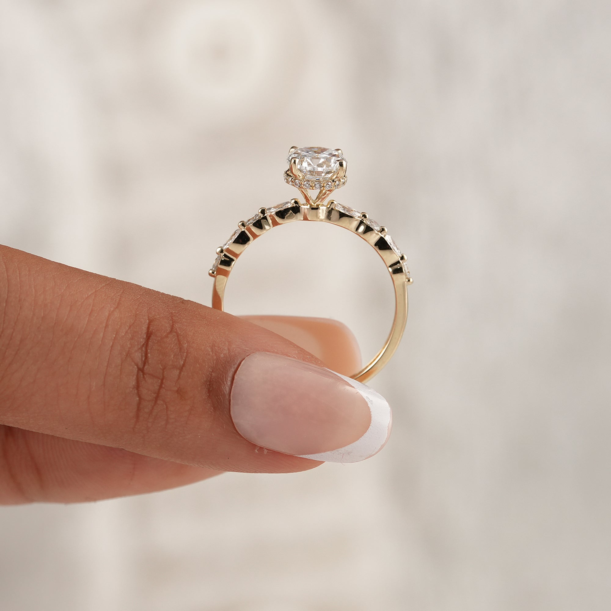 Elegant round lab diamond engagement ring with marquise accents