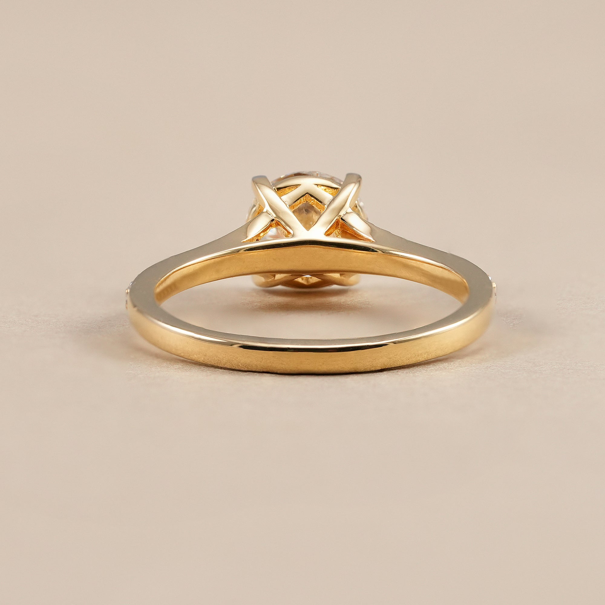 Luxury round solitaire engagement ring handcrafted in gold