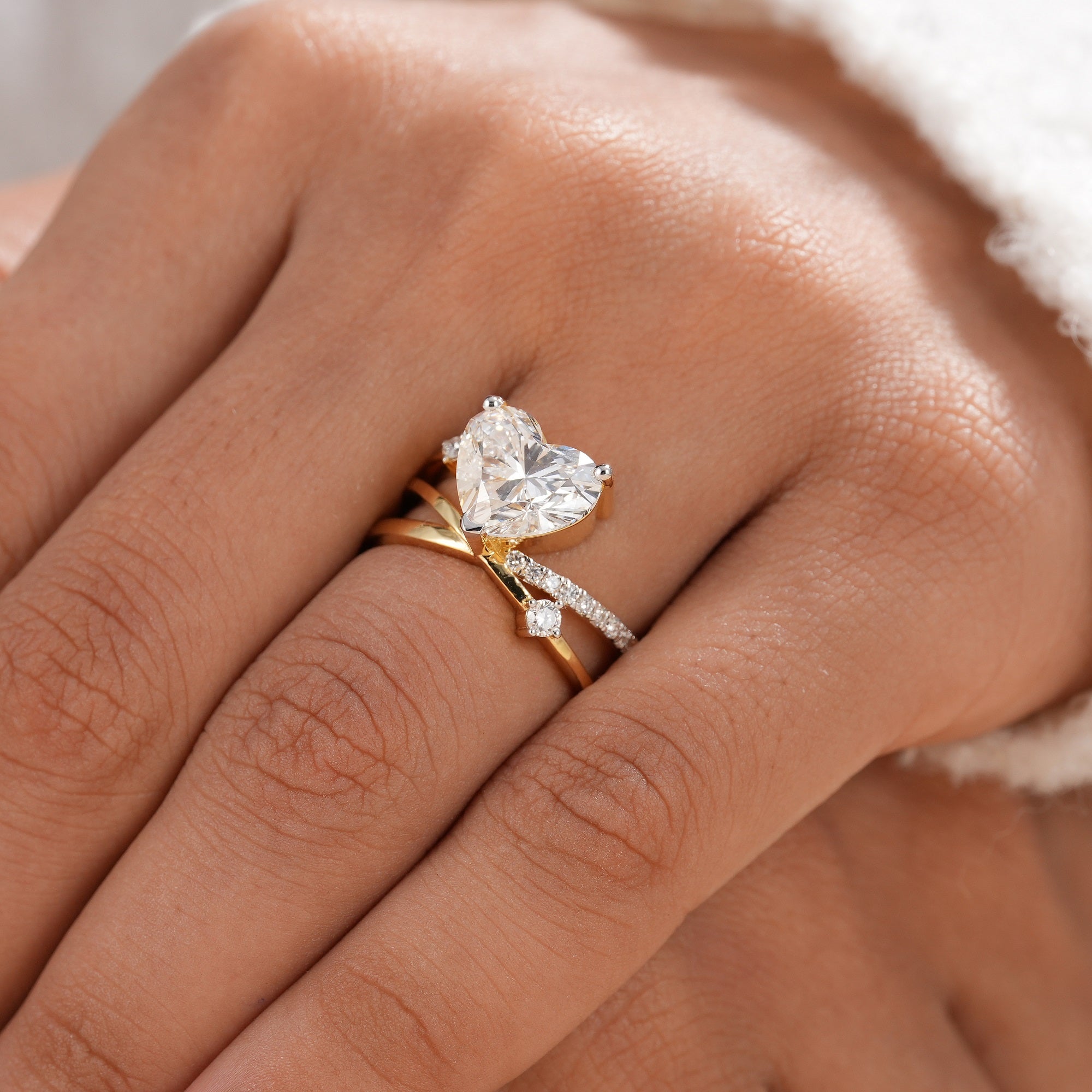 Heart lab grown diamond ring with sculptural bypass setting