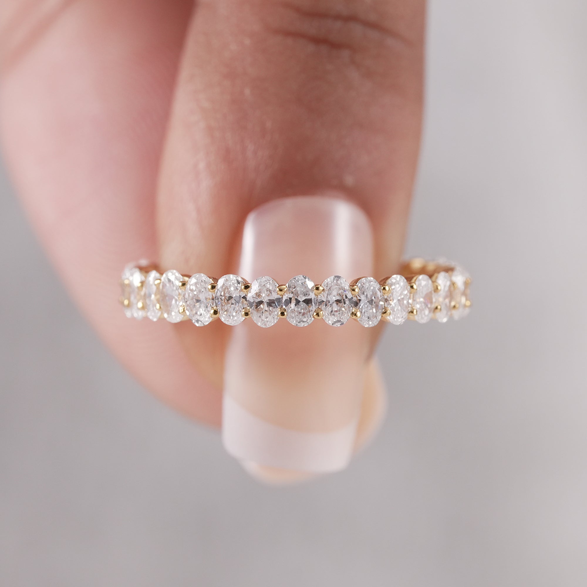 Oval eternity ring with brilliant lab grown diamonds.