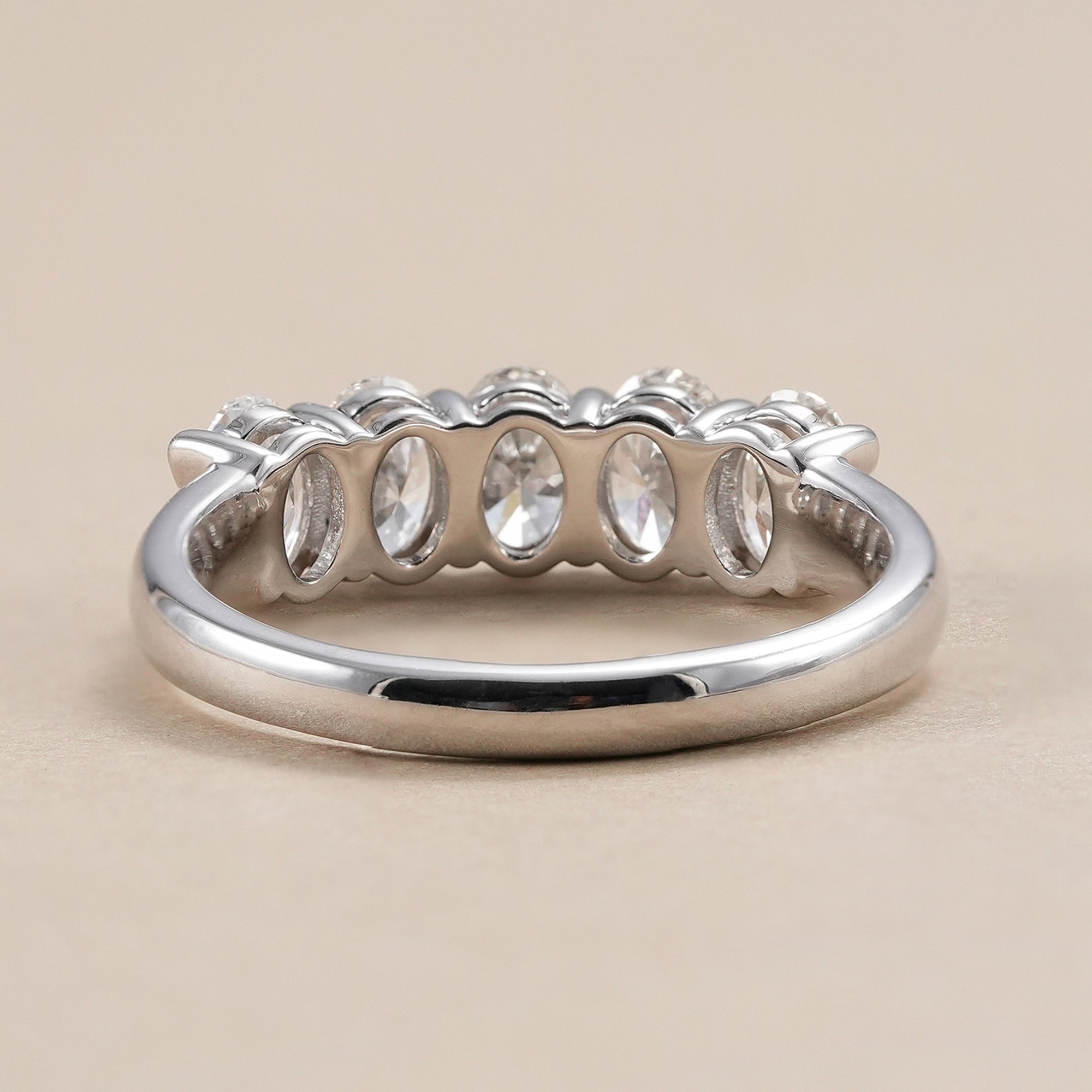 Stackable oval diamond band with brilliant lab grown diamonds.