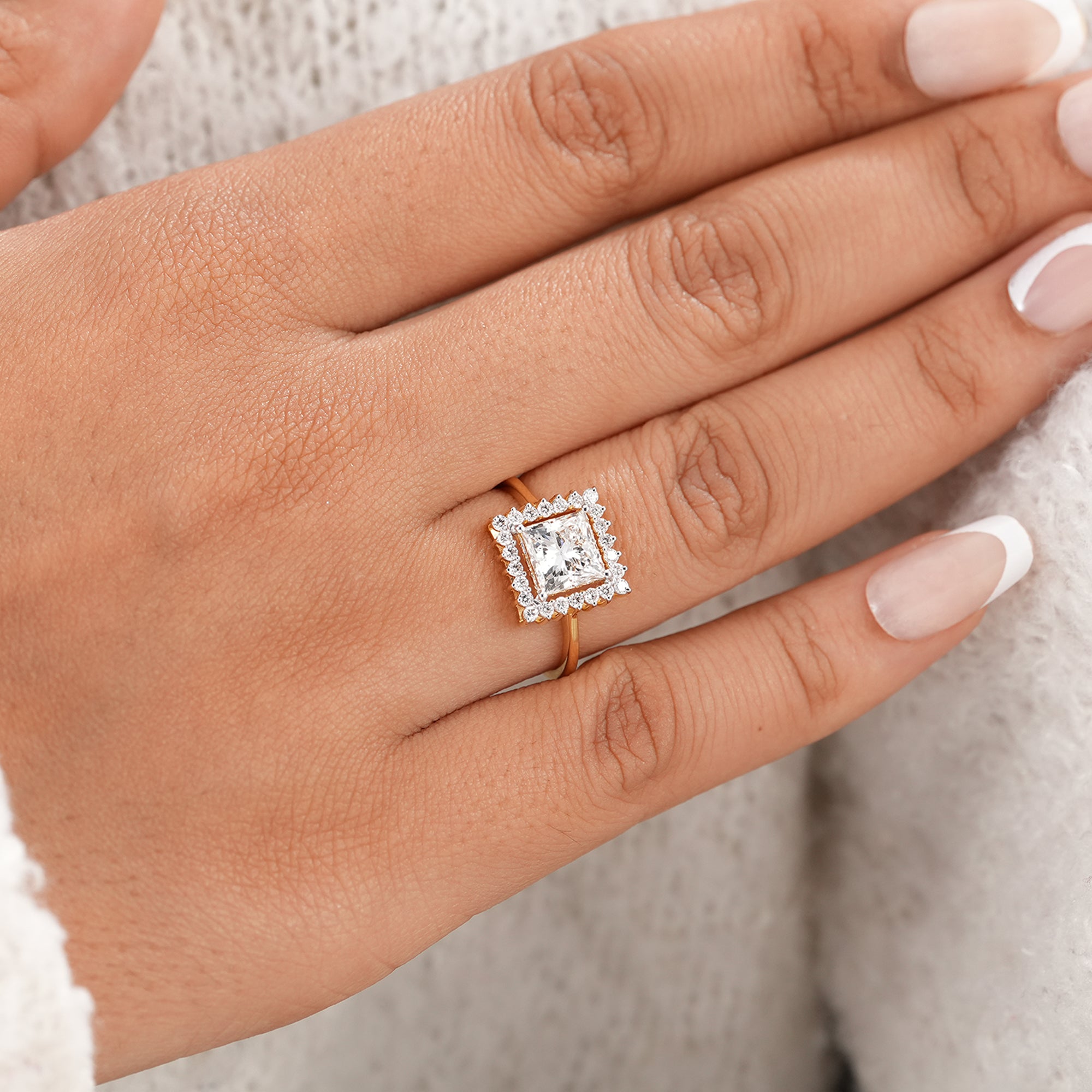 Women's princess halo engagement ring in solid gold