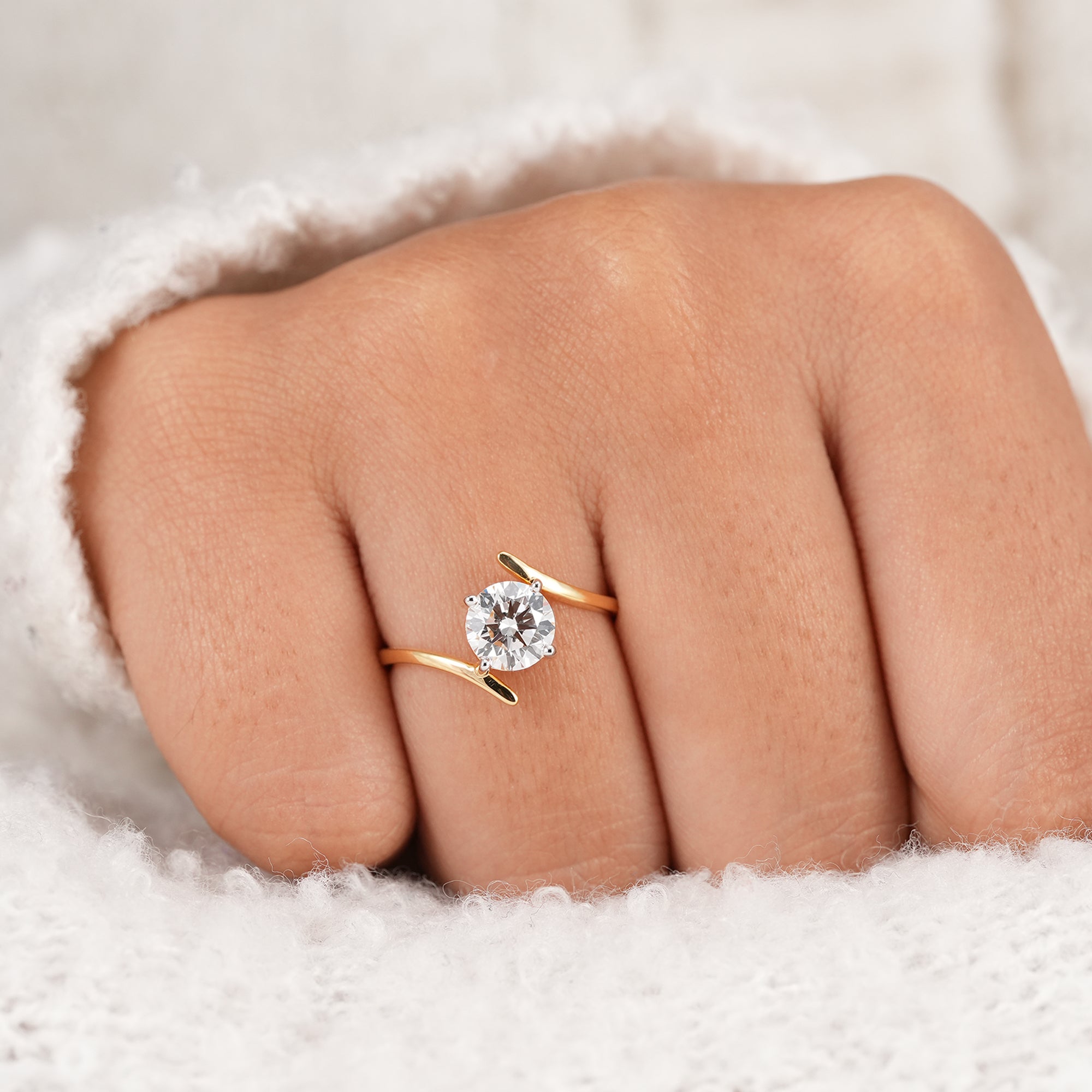 Minimalist round diamond twist band proposal ring