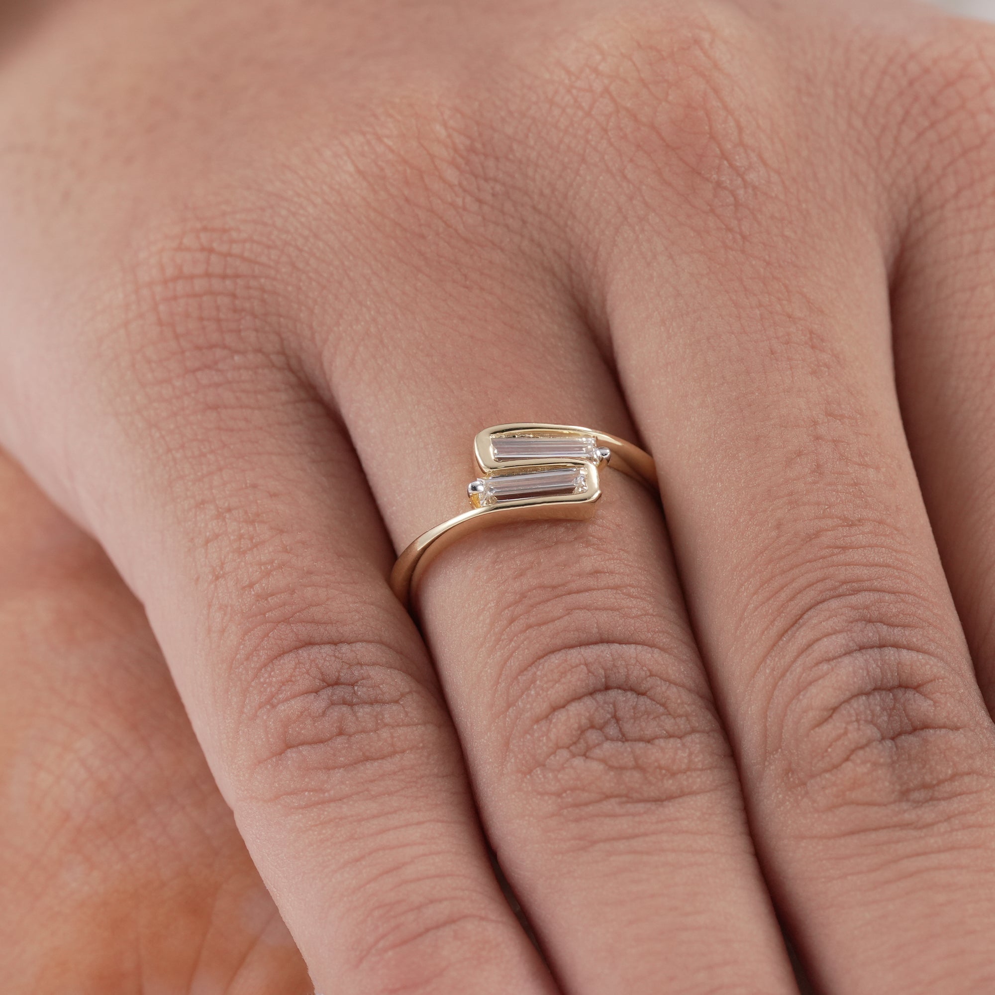 Unique gold wedding band with baguette lab diamonds