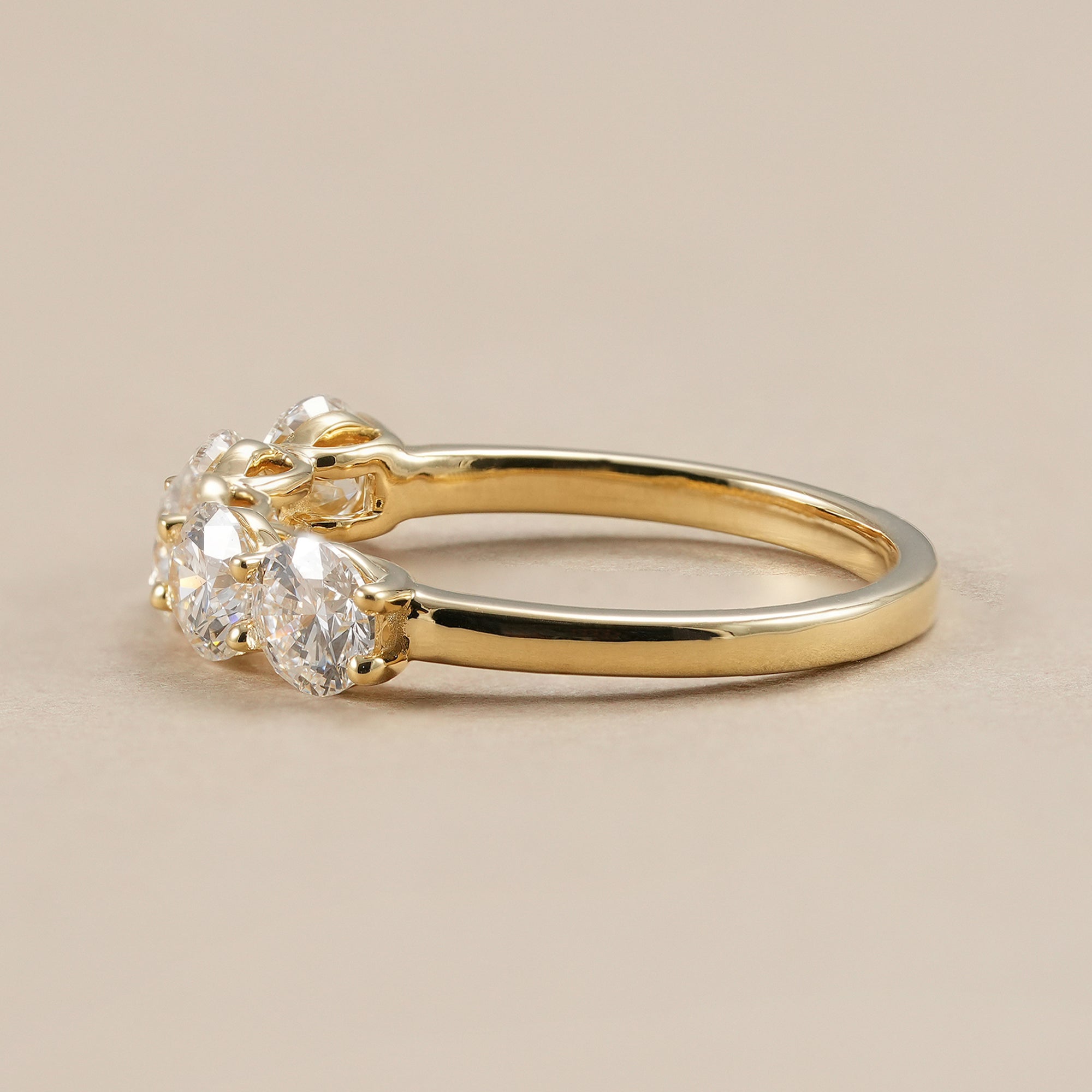 Stackable round diamond anniversary ring handcrafted in gold.