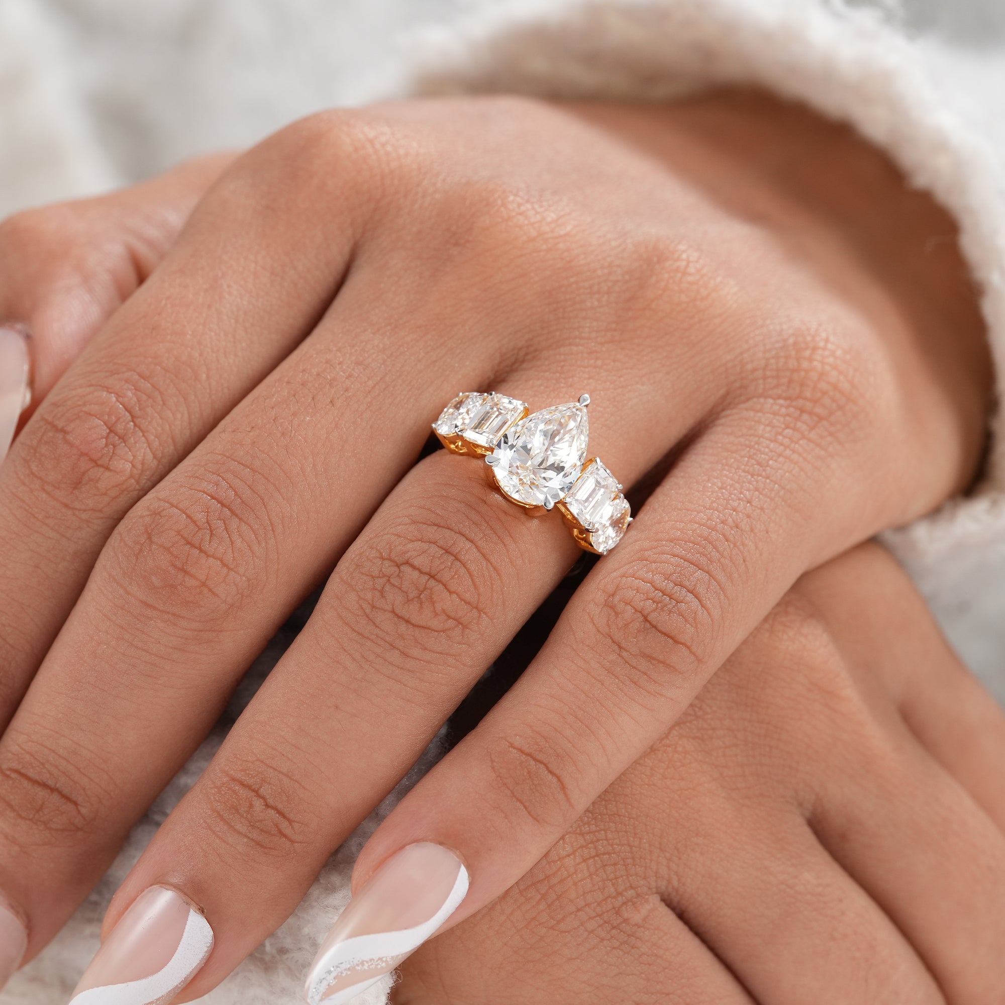 Luxury five stone lab grown diamond engagement ring.