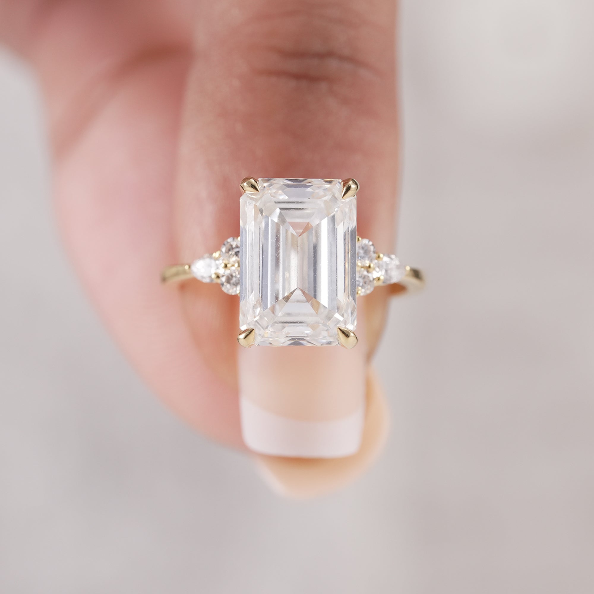 Four prong emerald cut lab grown diamond ring