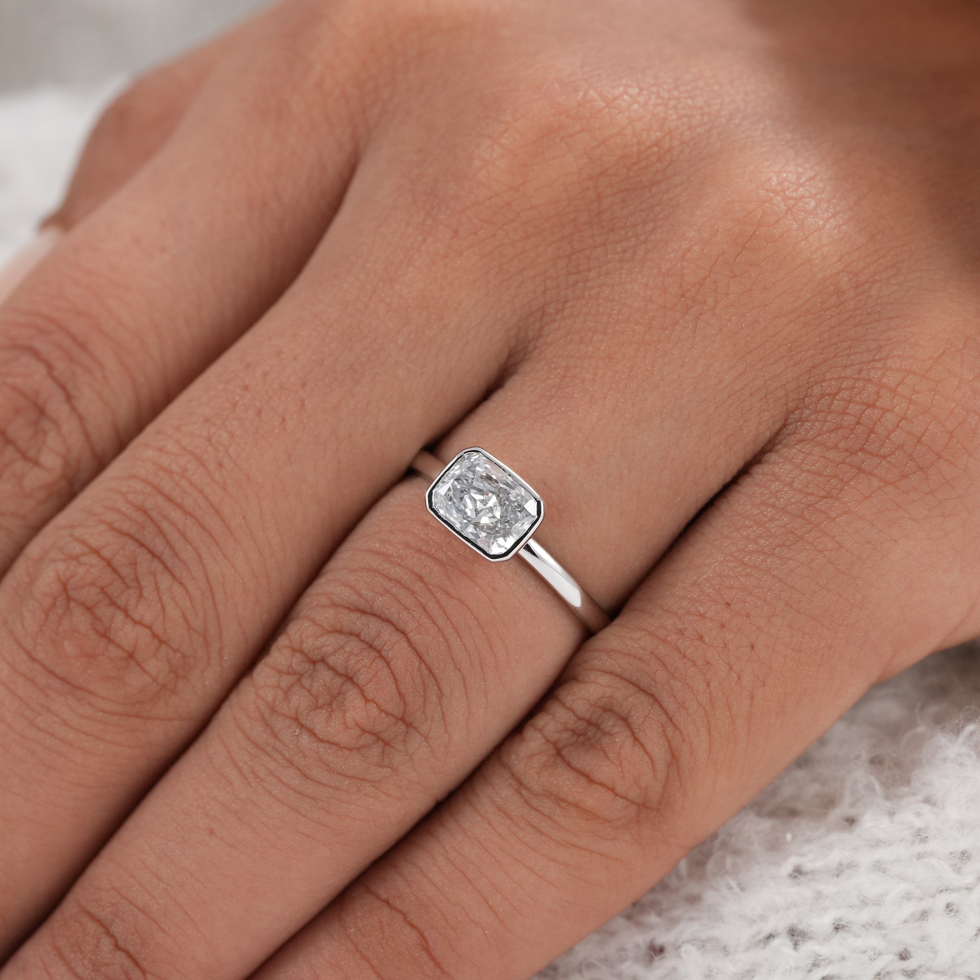 Contemporary engagement ring featuring radiant lab grown diamond