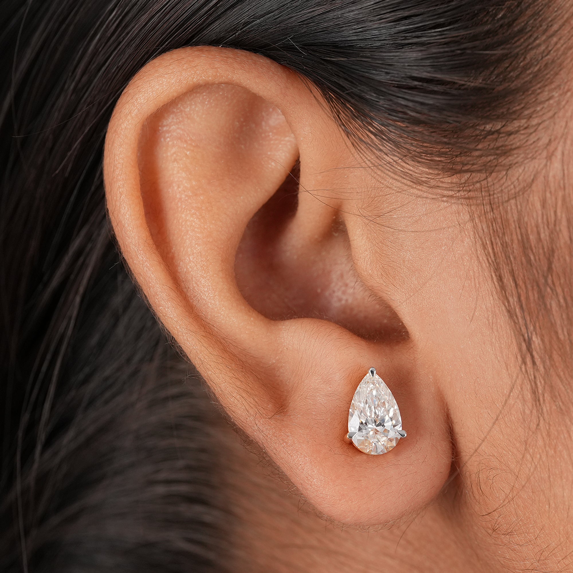 Classic teardrop diamond stud earrings in yellow gold