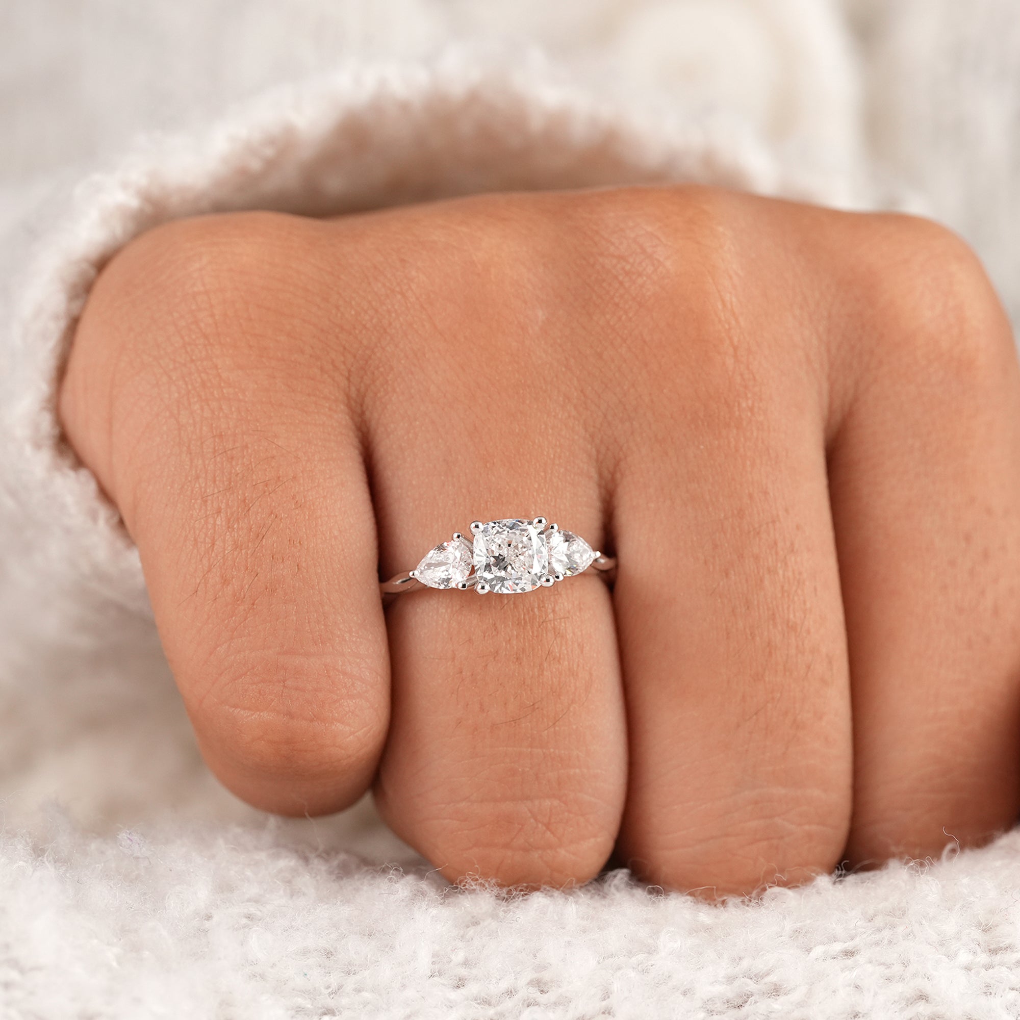 Past present future cushion diamond ring close-up