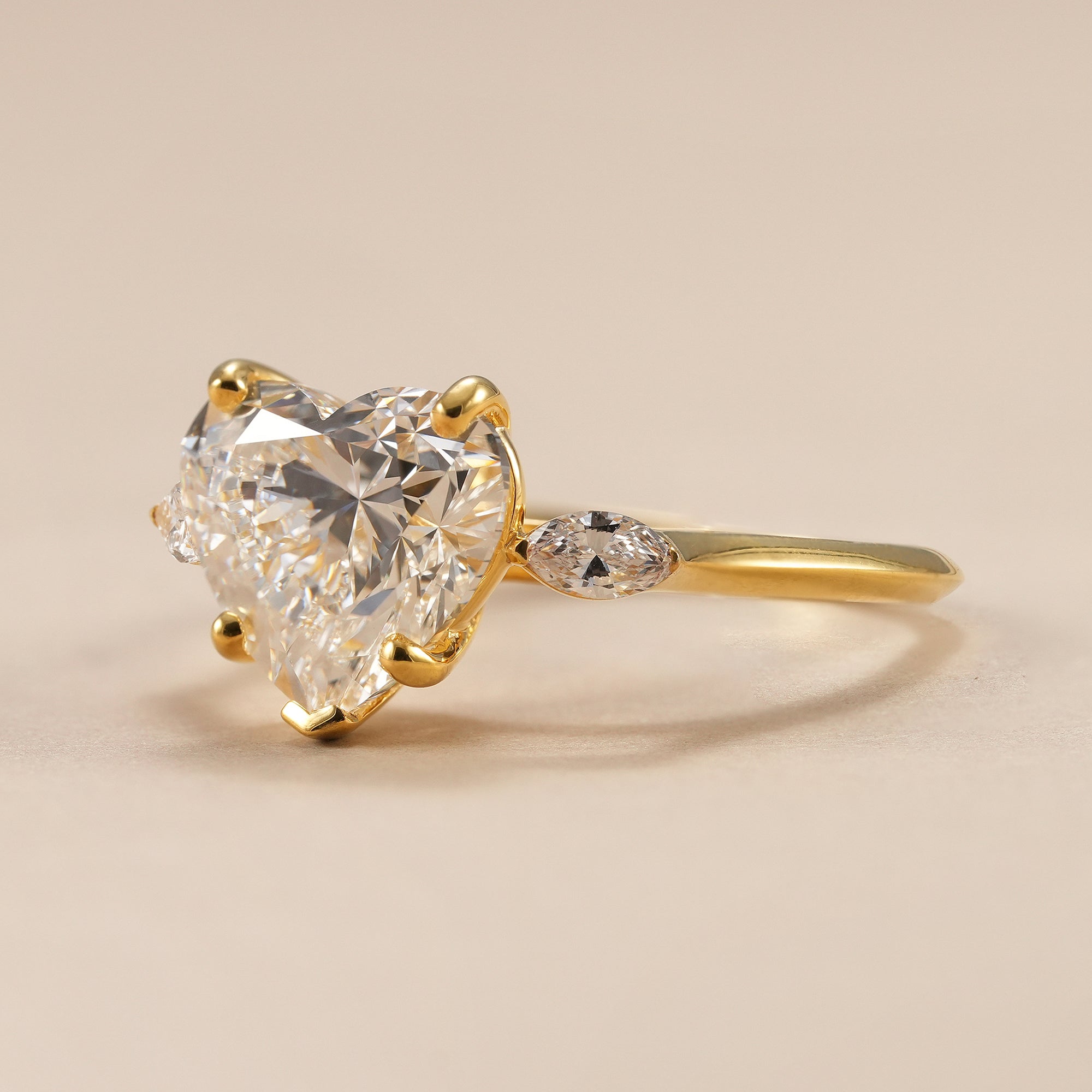 IGI certified 4 CT heart diamond engagement ring for women.