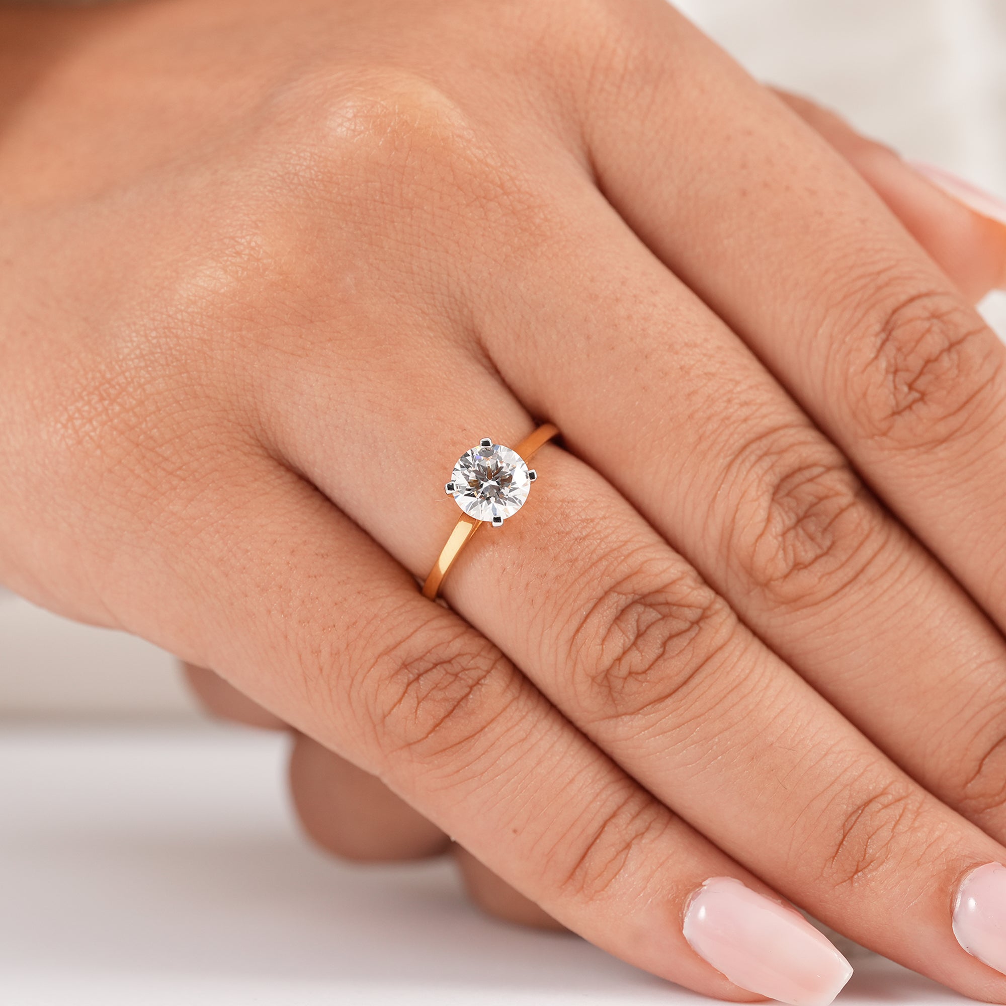 Timeless round solitaire bridal ring with ethically grown diamond