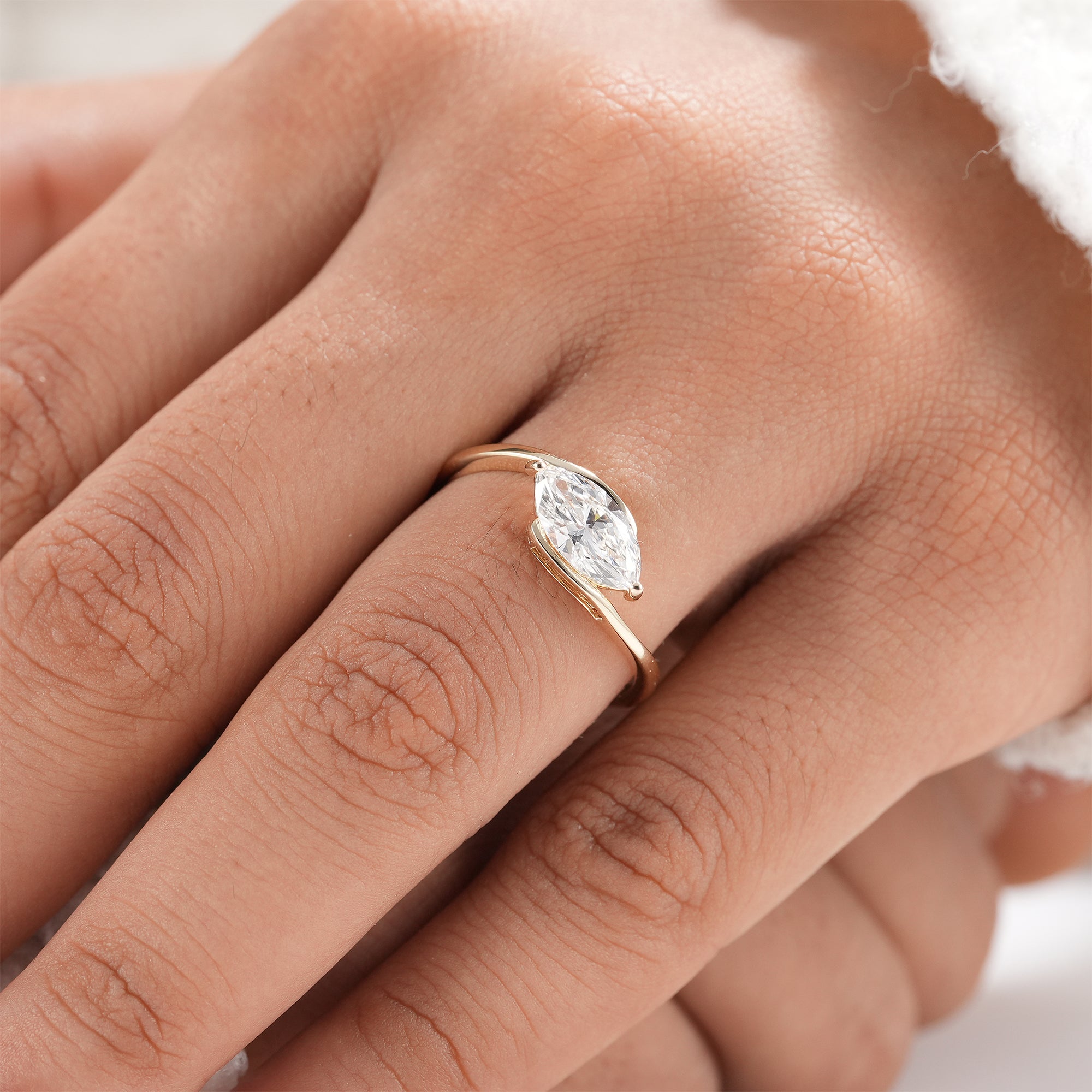 Timeless lab grown diamond bypass engagement ring.