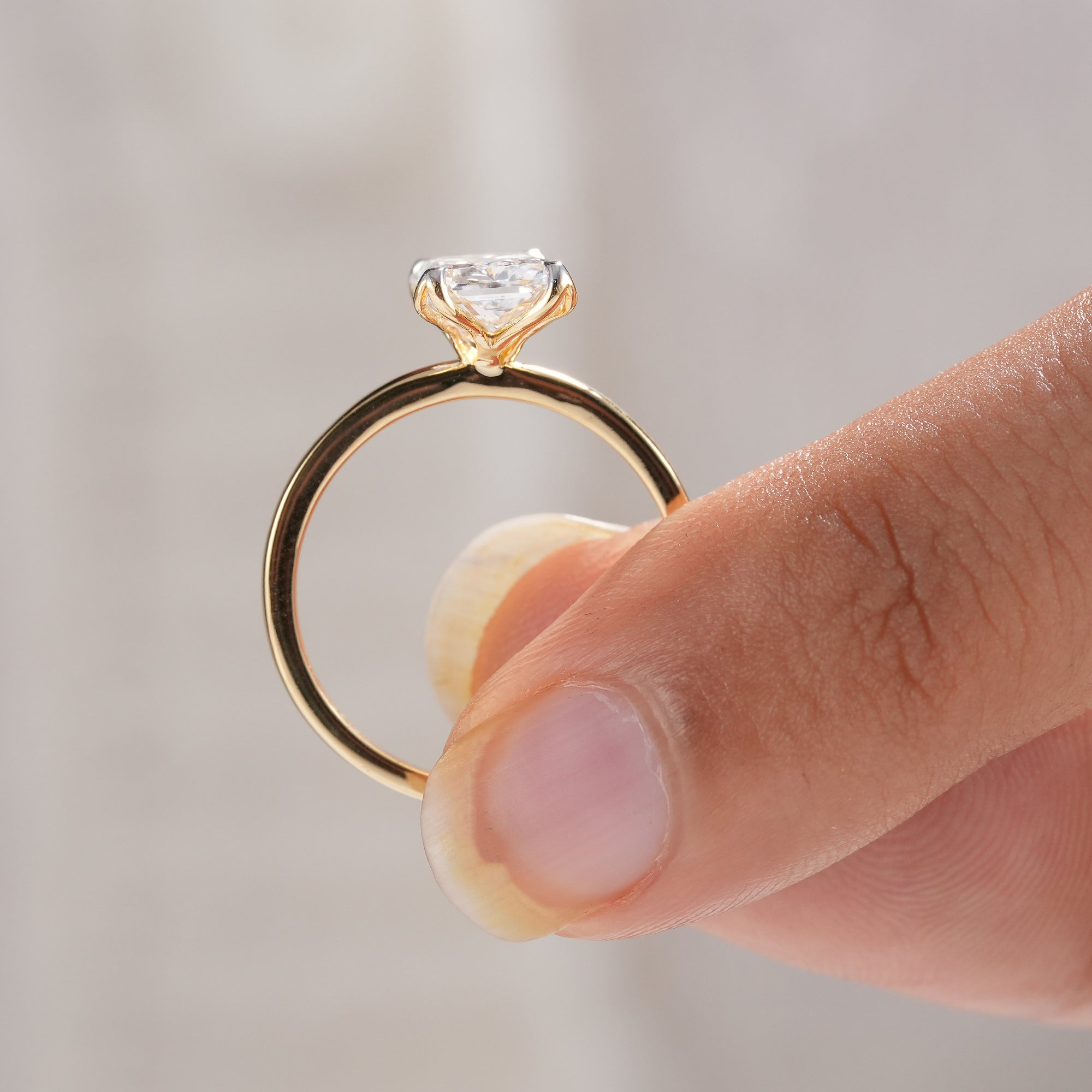 Radiant diamond bridal jewelry with elegant solitaire setting.