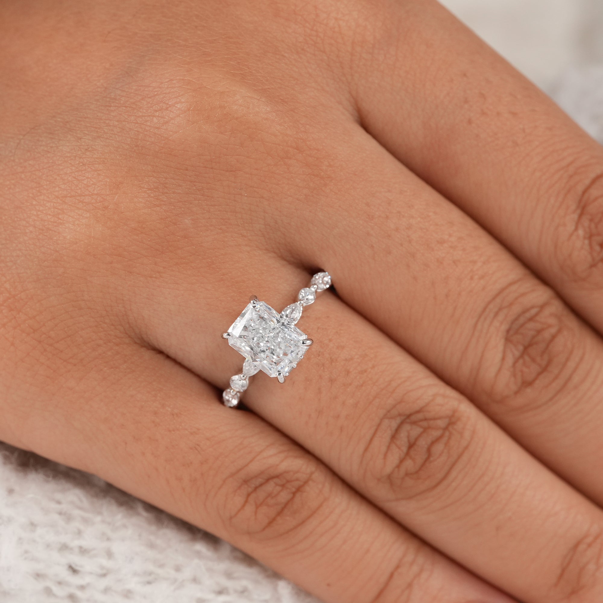 Timeless radiant hidden halo engagement ring for women.
