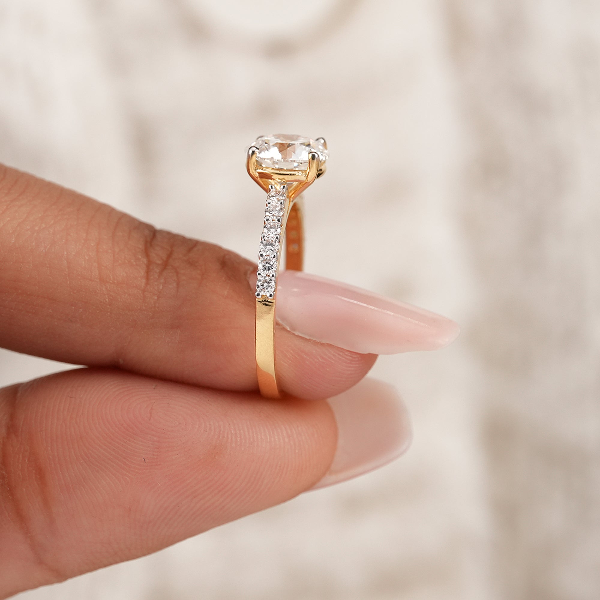 Everyday round solitaire diamond ring with pavé shank