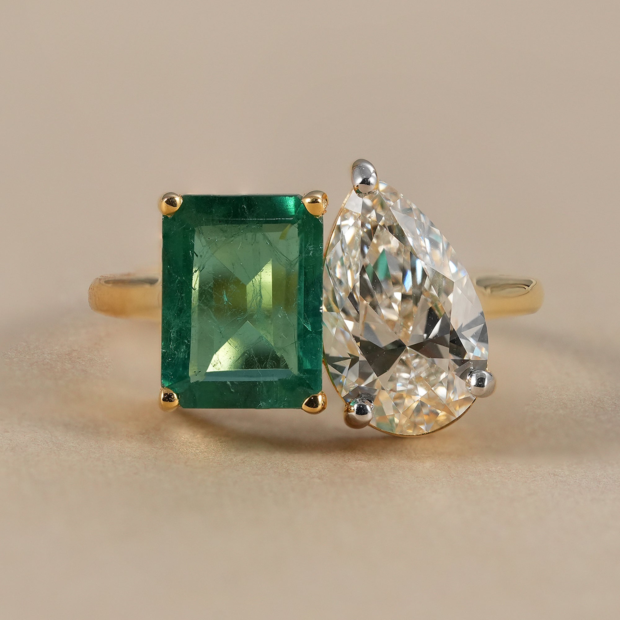Toi et Moi emerald and pear lab grown diamond engagement ring in yellow gold