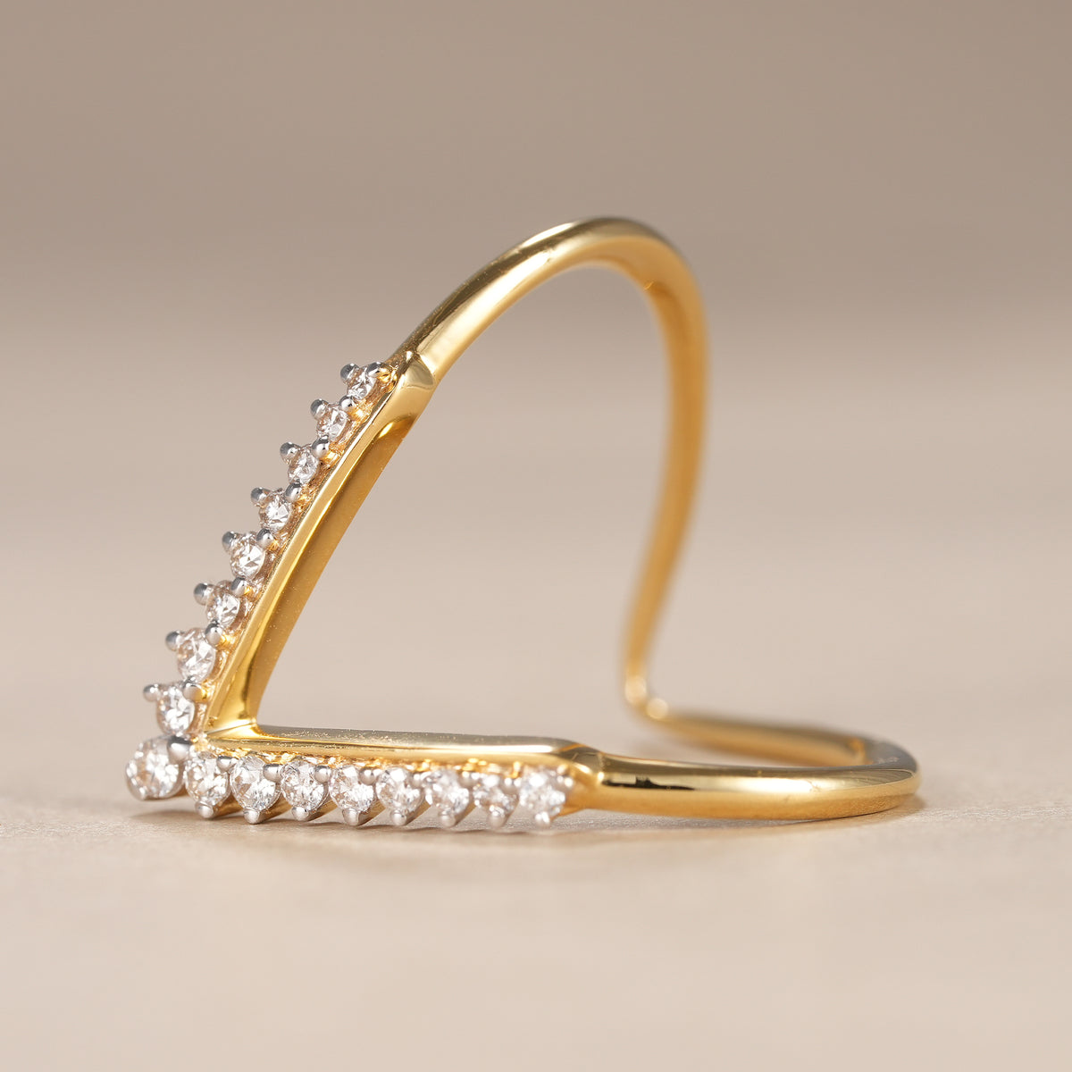 Minimalist V shaped wedding band featuring brilliant lab grown diamonds in solid gold.