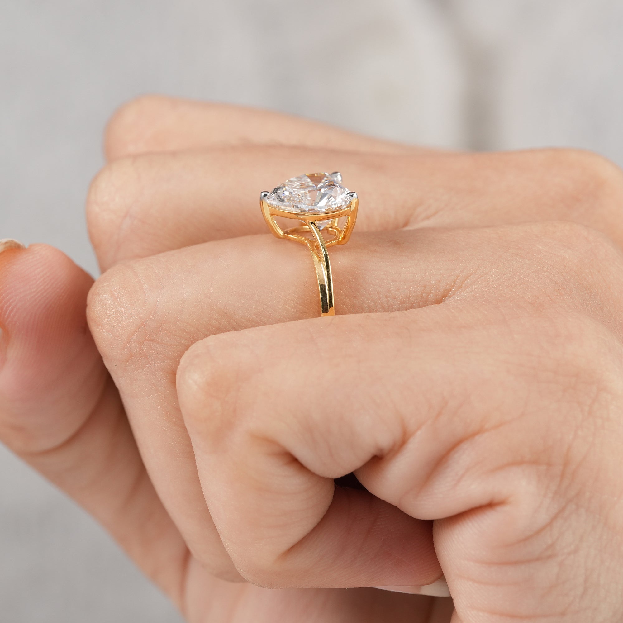 Elegant heart solitaire ring with brilliant lab diamond.